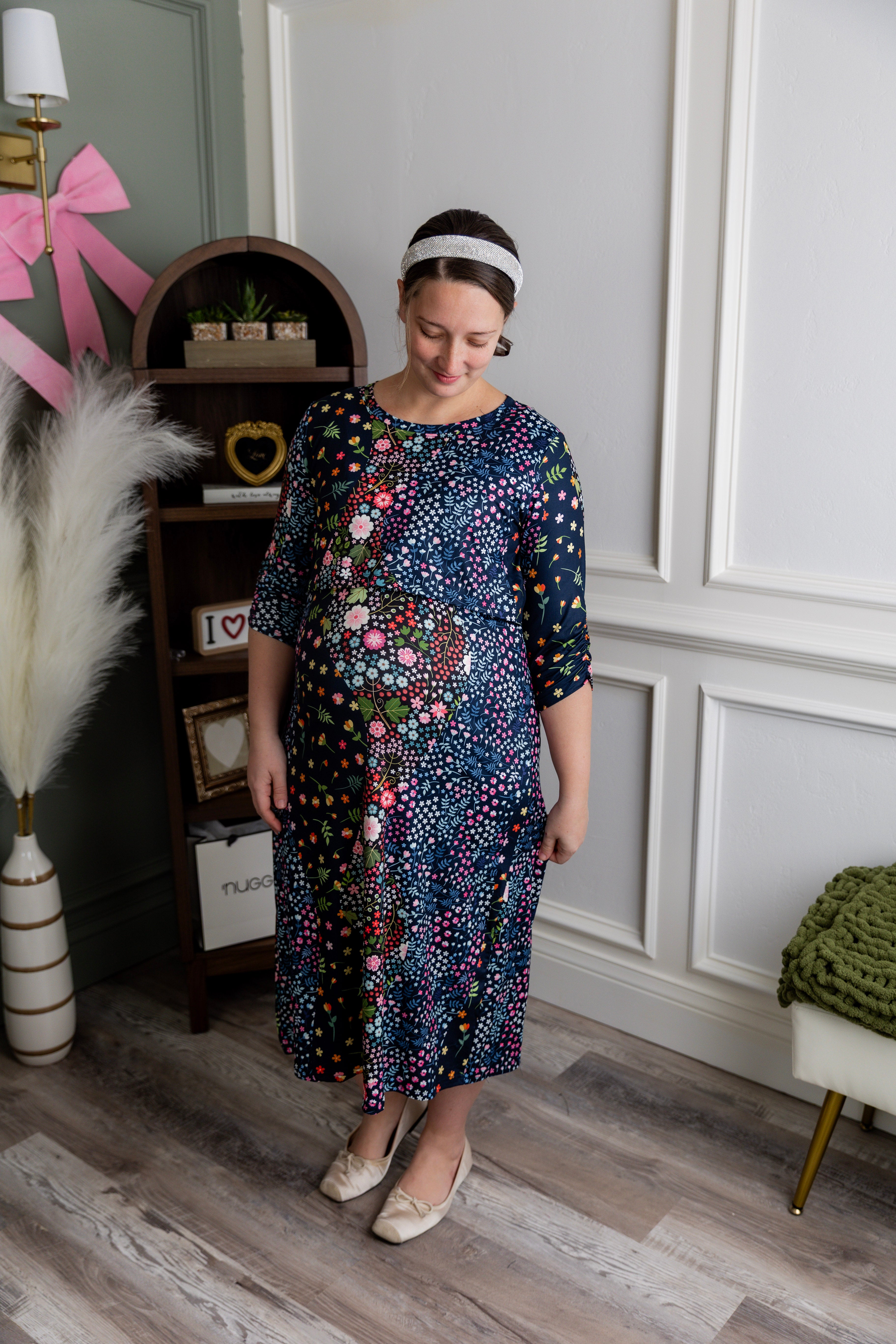 Model wearing Nuggles® Nalani Nursing Dress in Star Garden