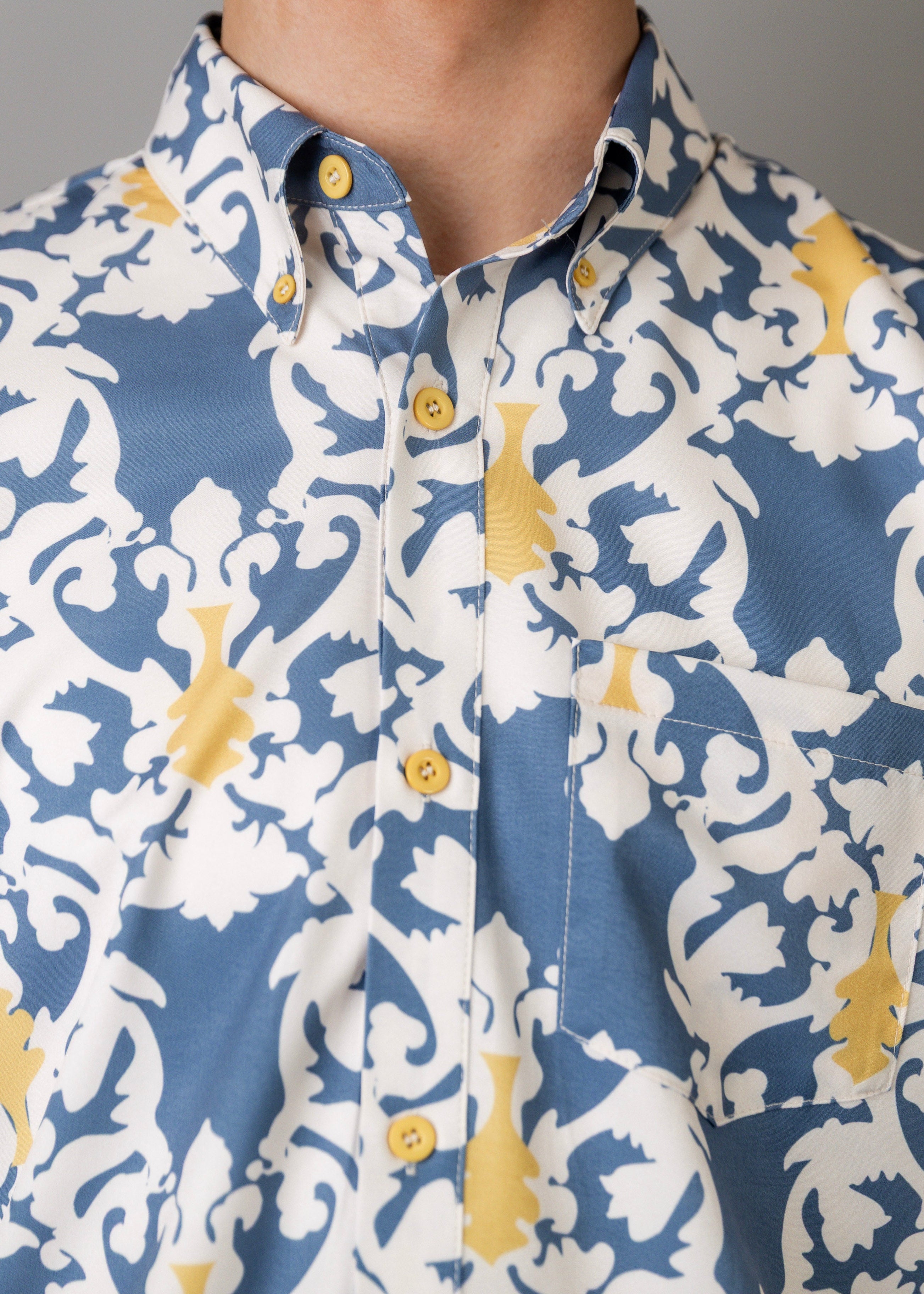 Model wearing Nuggles® Men's Button Down Shirt in Steel Damask