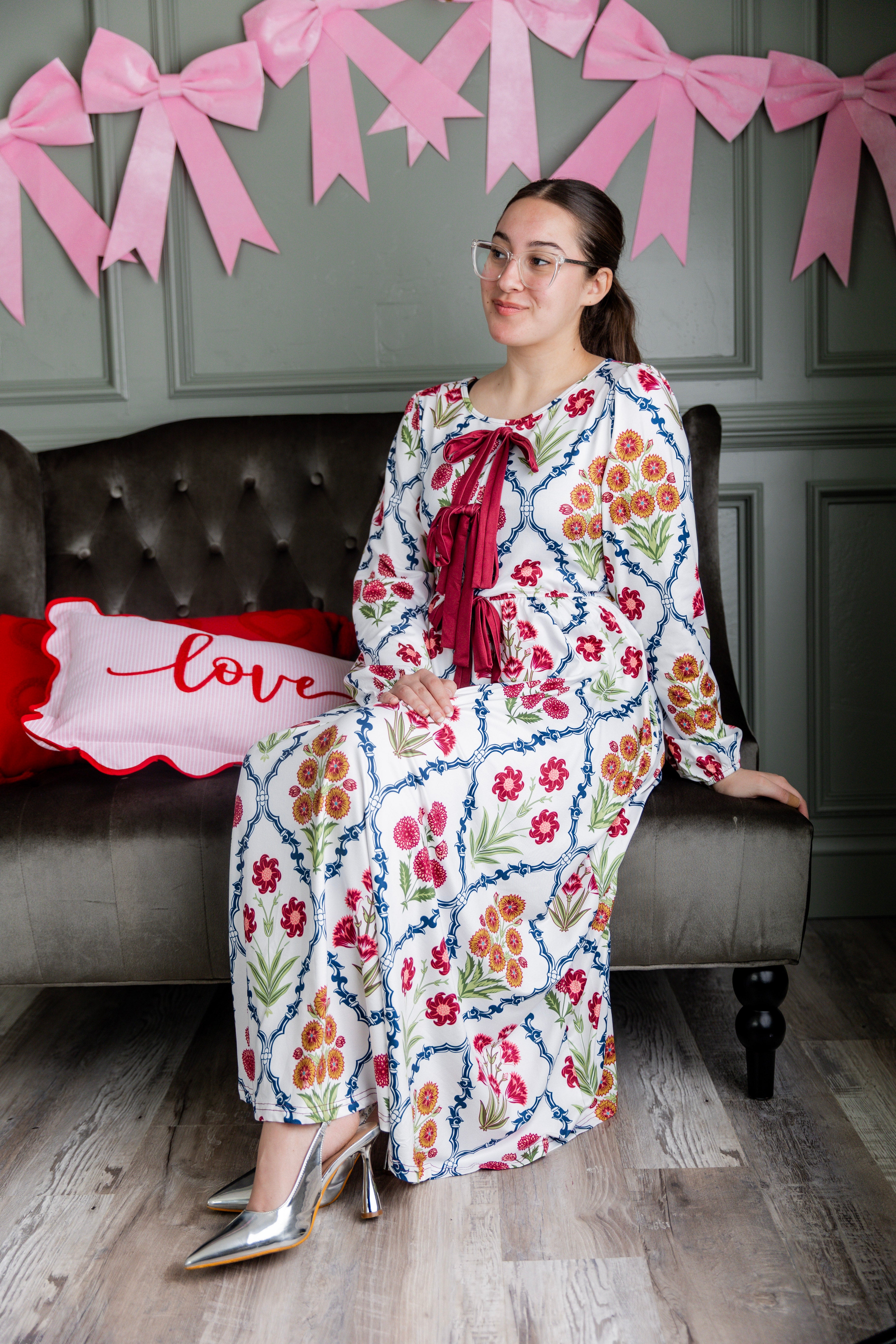 Model wearing the Nuggles® Addison Dress in Wildflower Trellis