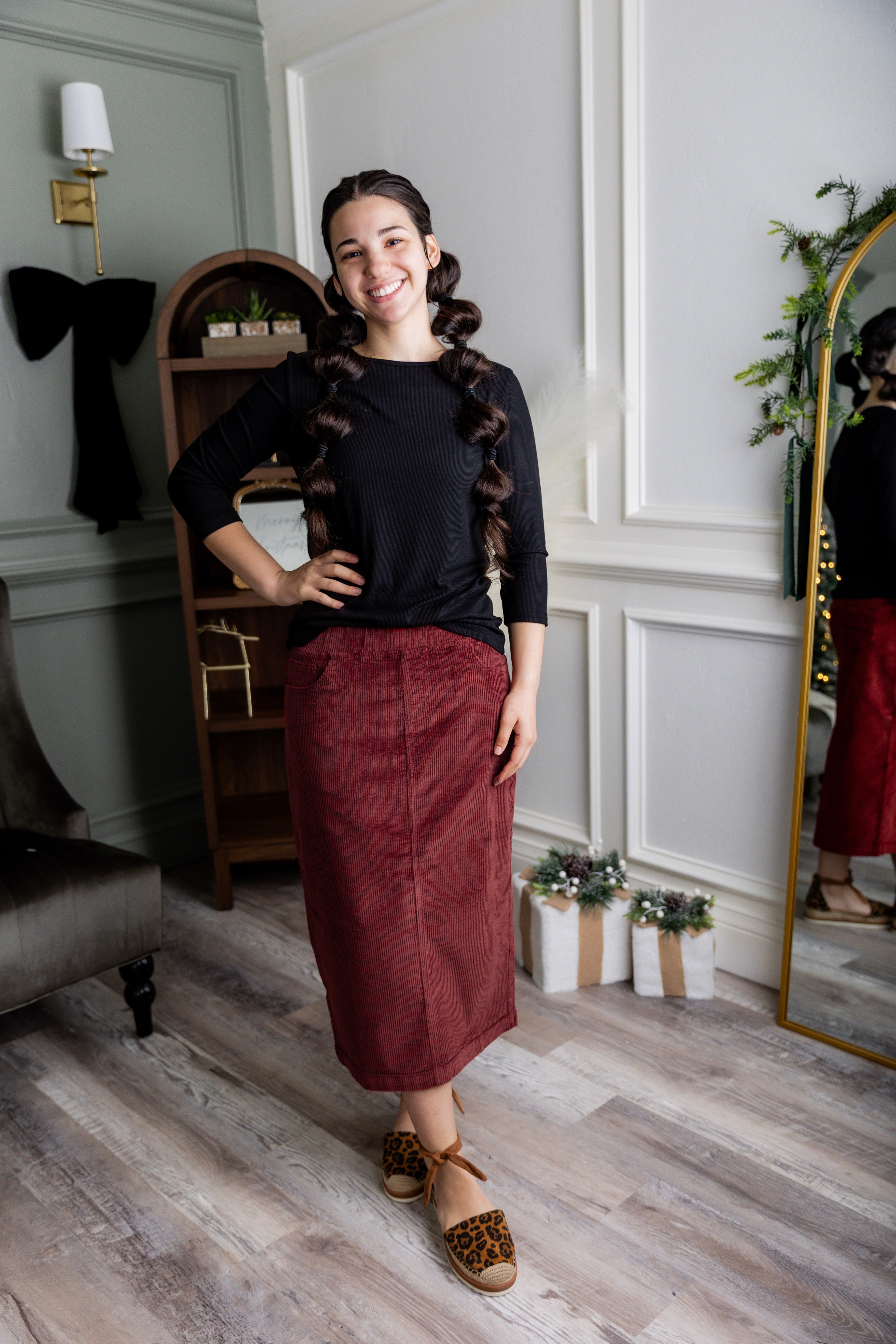 Model wearing Nuggles® 31-inch corduroy skirt