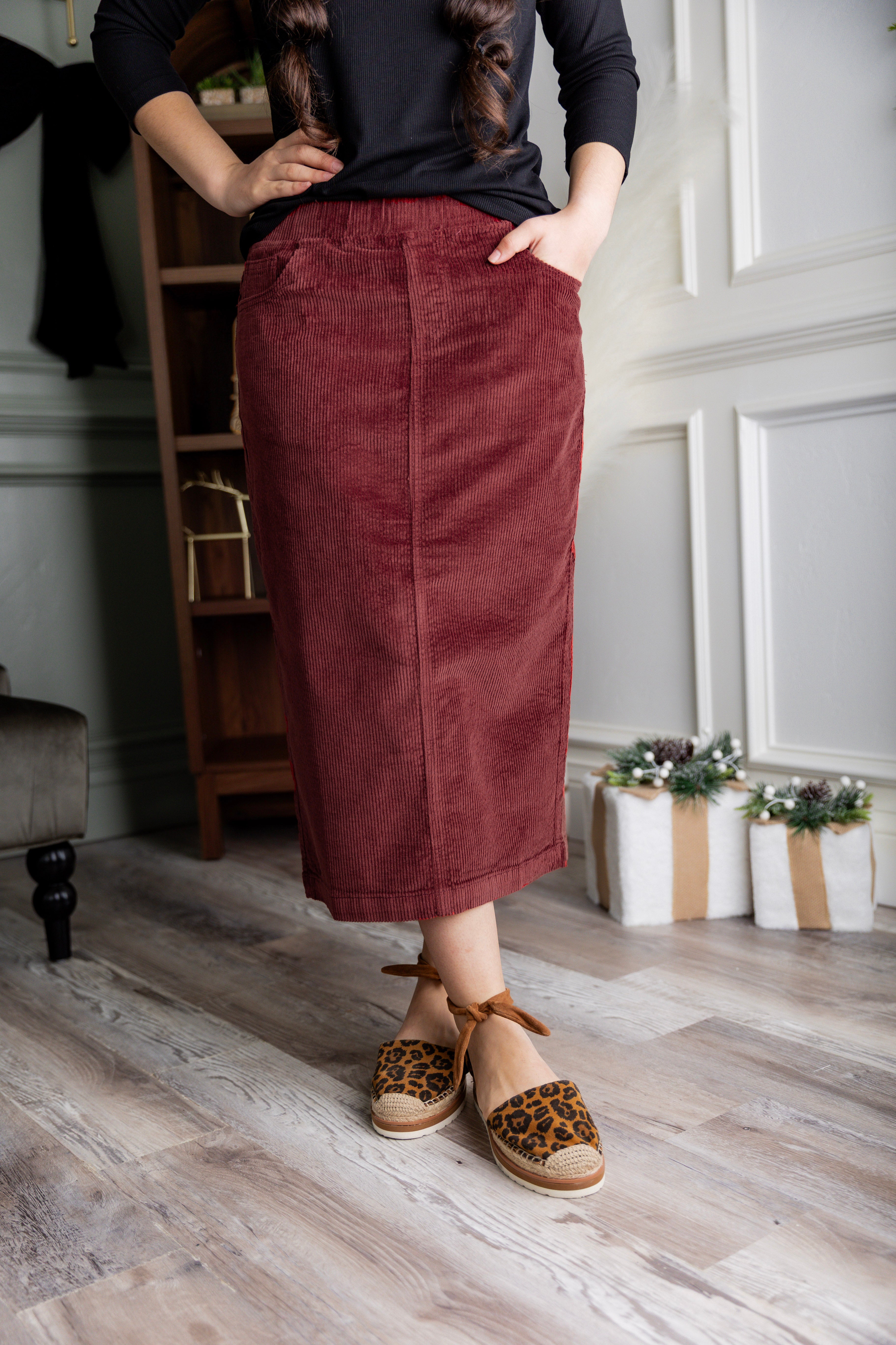 Model wearing Nuggles® 31-inch corduroy skirt