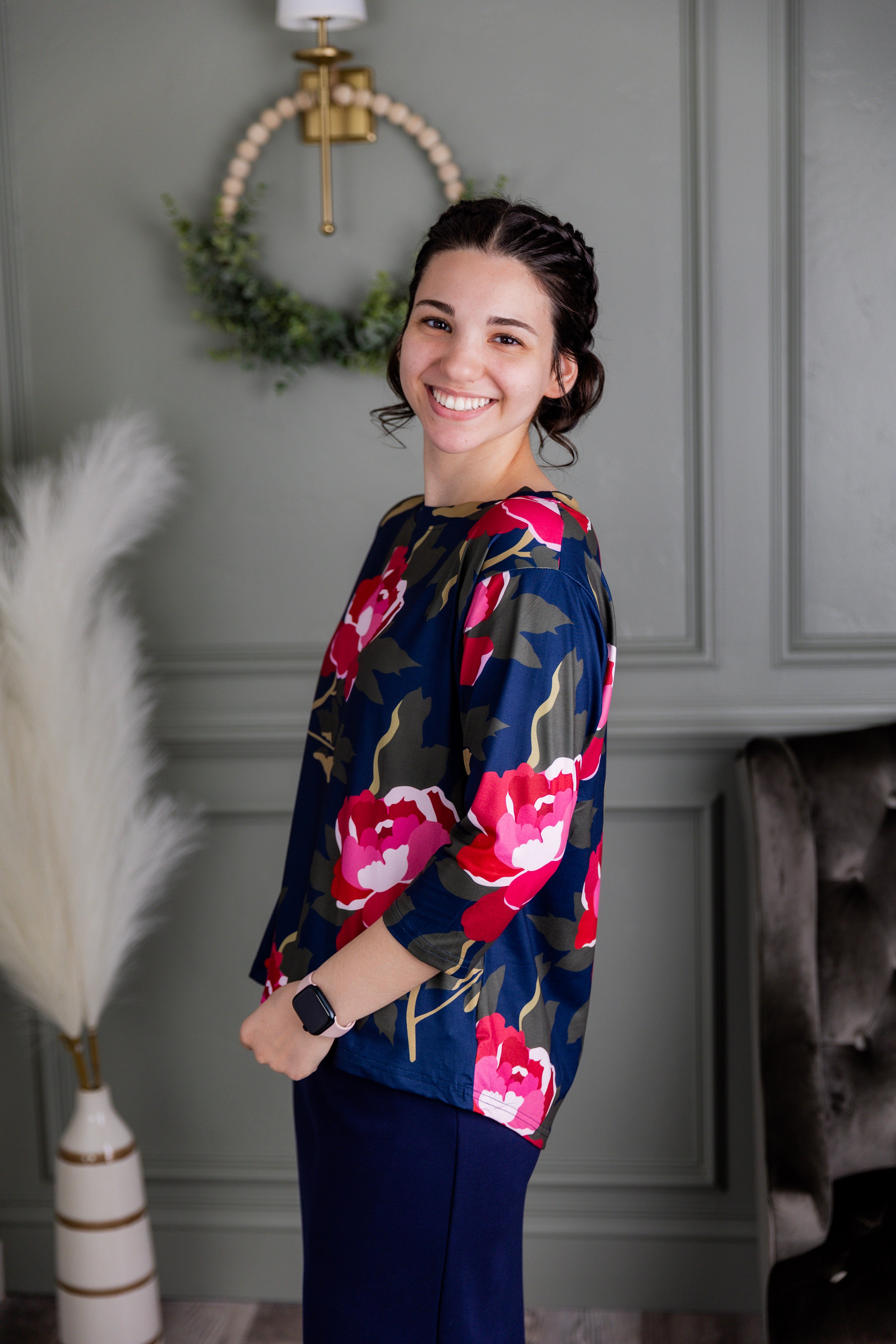 Model wearing the Nuggles® Lucia Top in Rosewood Nights