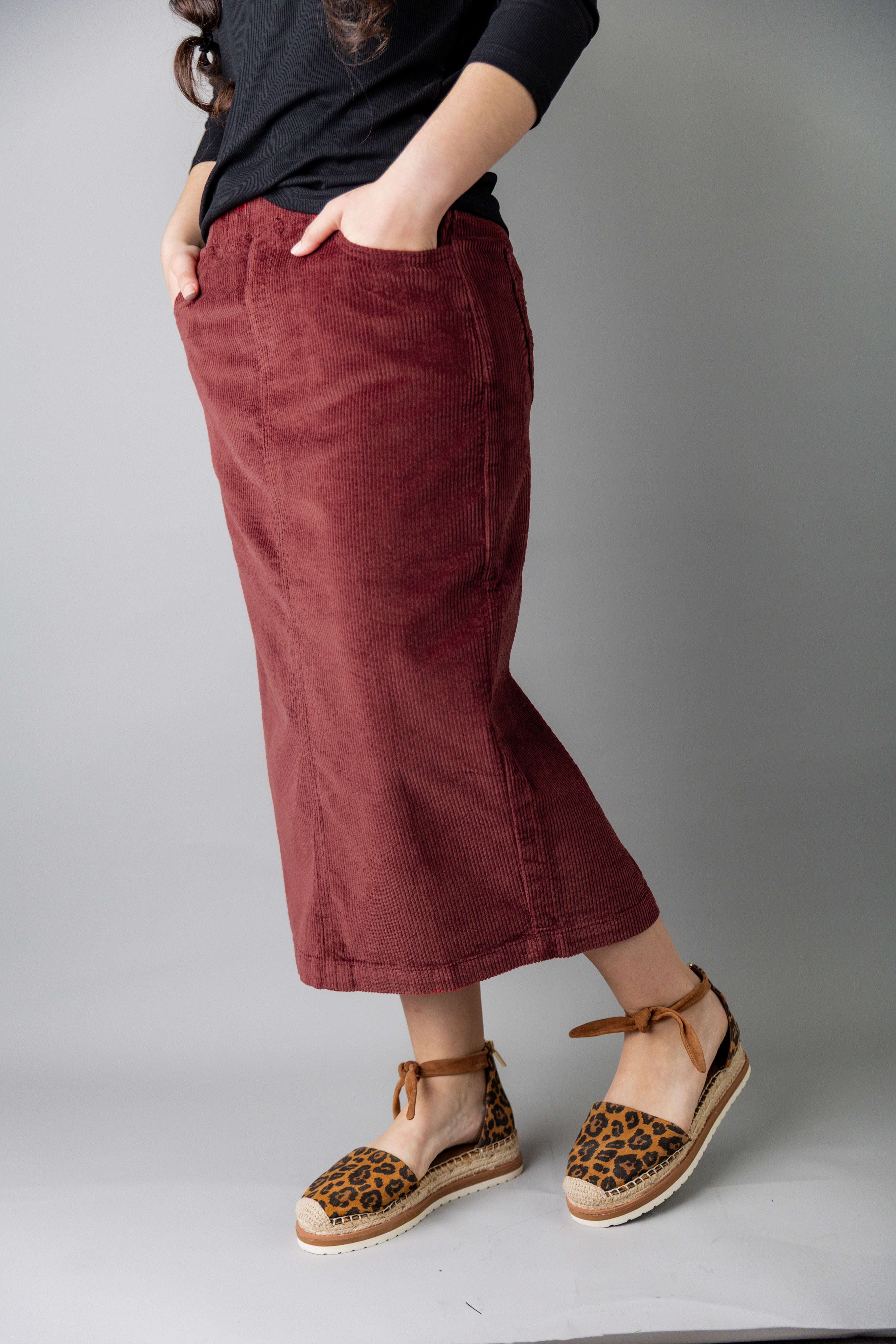 Model wearing Nuggles® 31-inch corduroy skirt