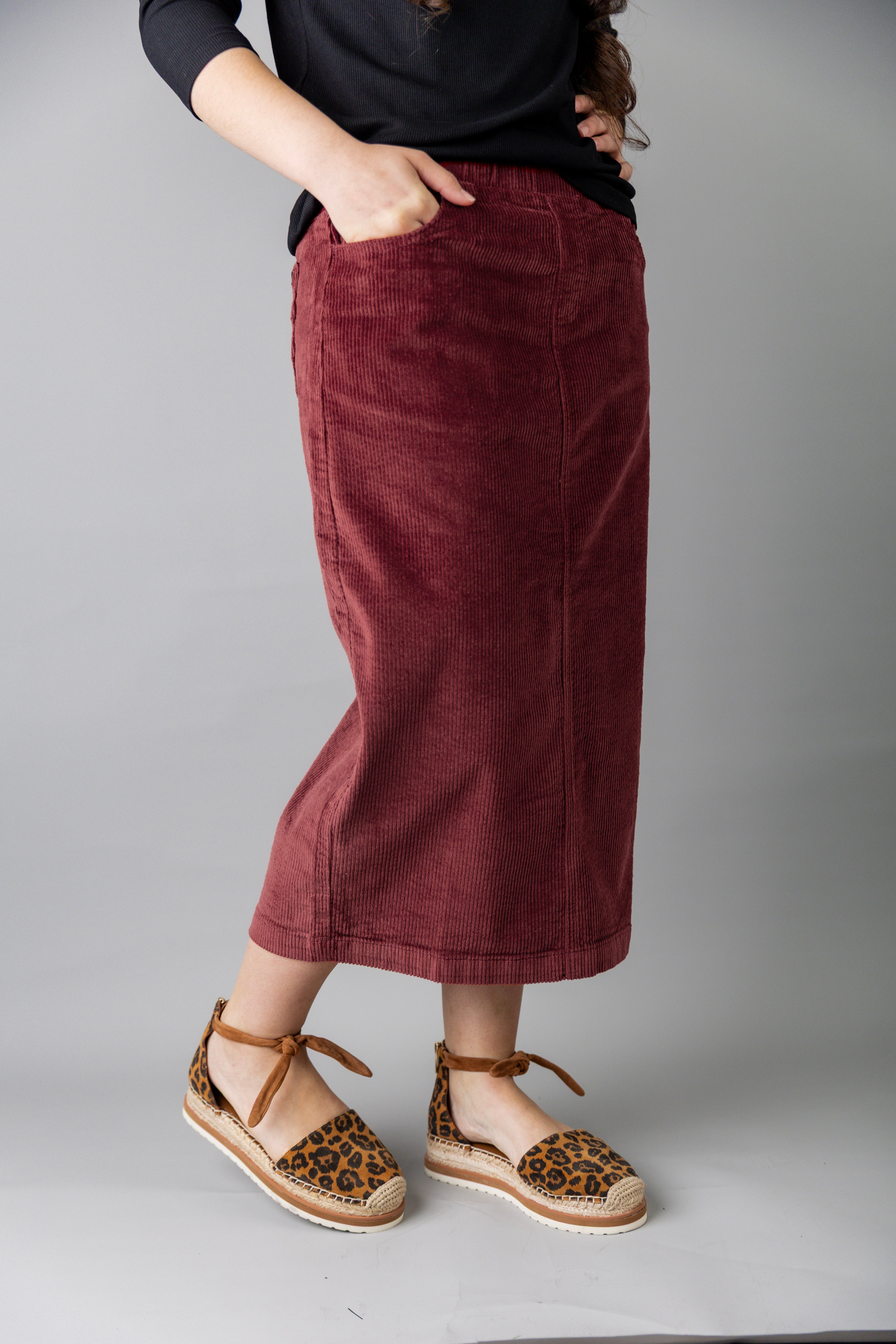 Model wearing Nuggles® 31-inch corduroy skirt