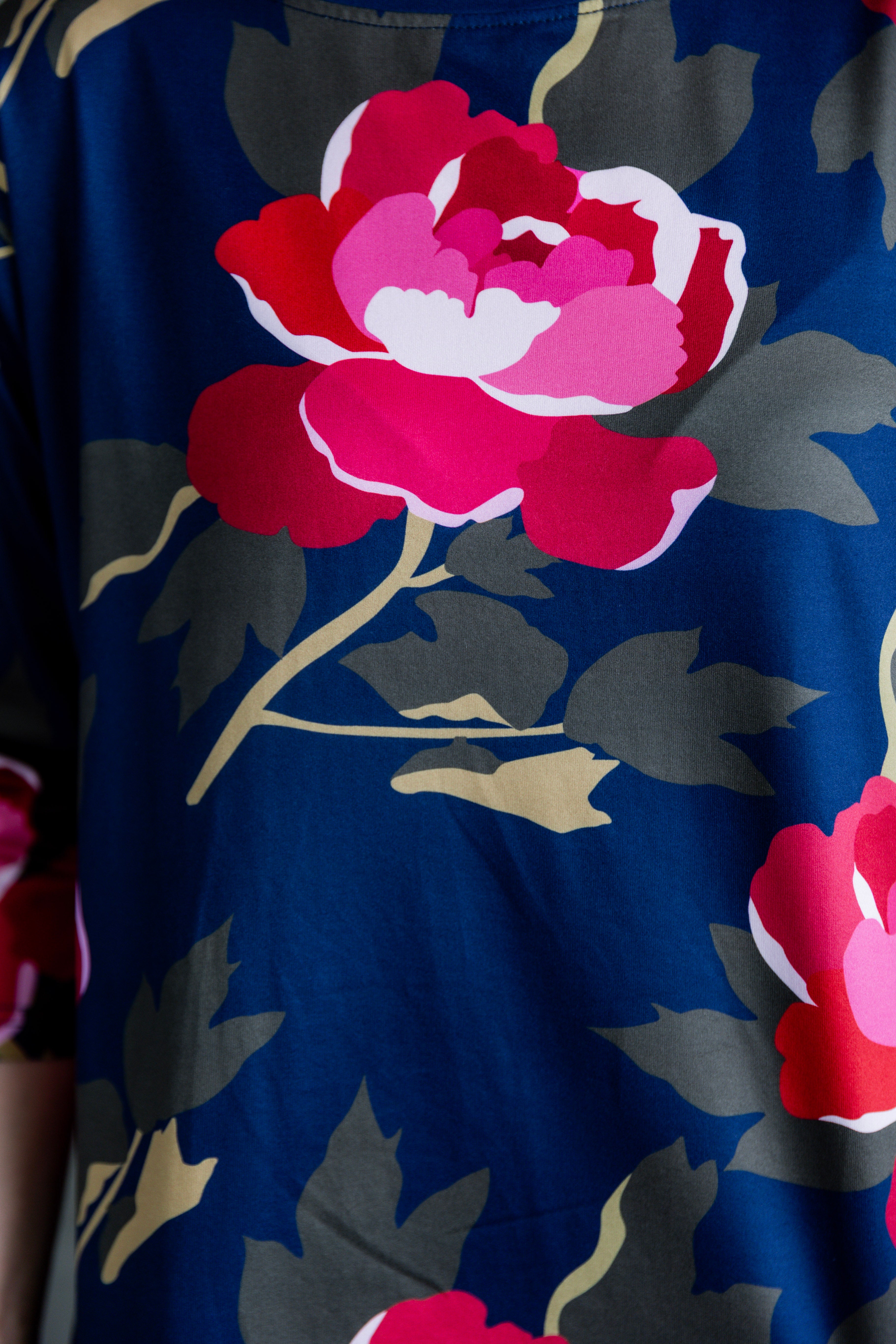 Model wearing the Nuggles® Lucia Top in Rosewood Nights