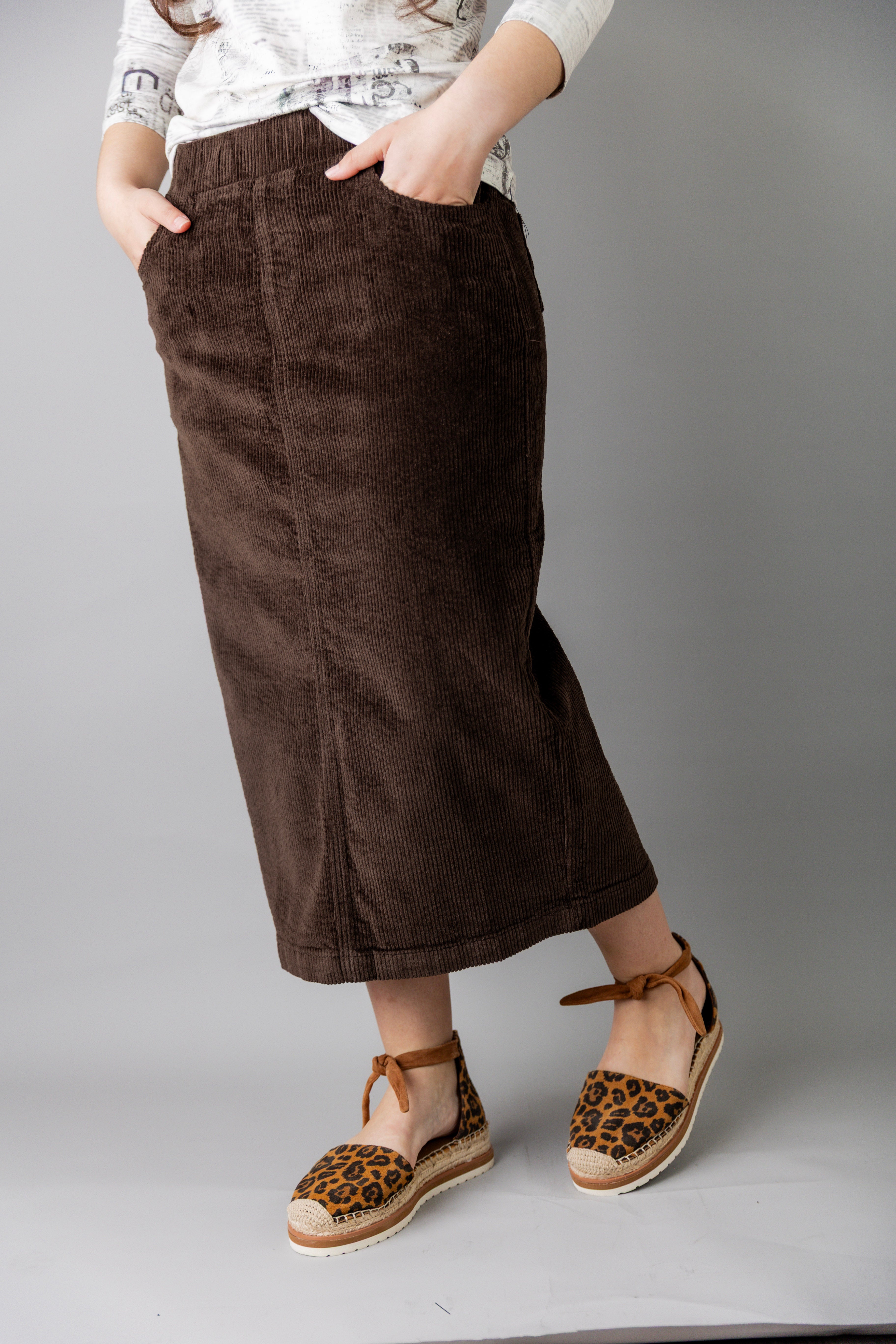 Model wearing Nuggles® 31-inch corduroy skirt