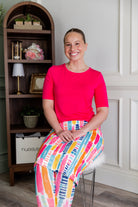 Stock photo of our Nuggles® Half Sleeve Tee in Hot Pink