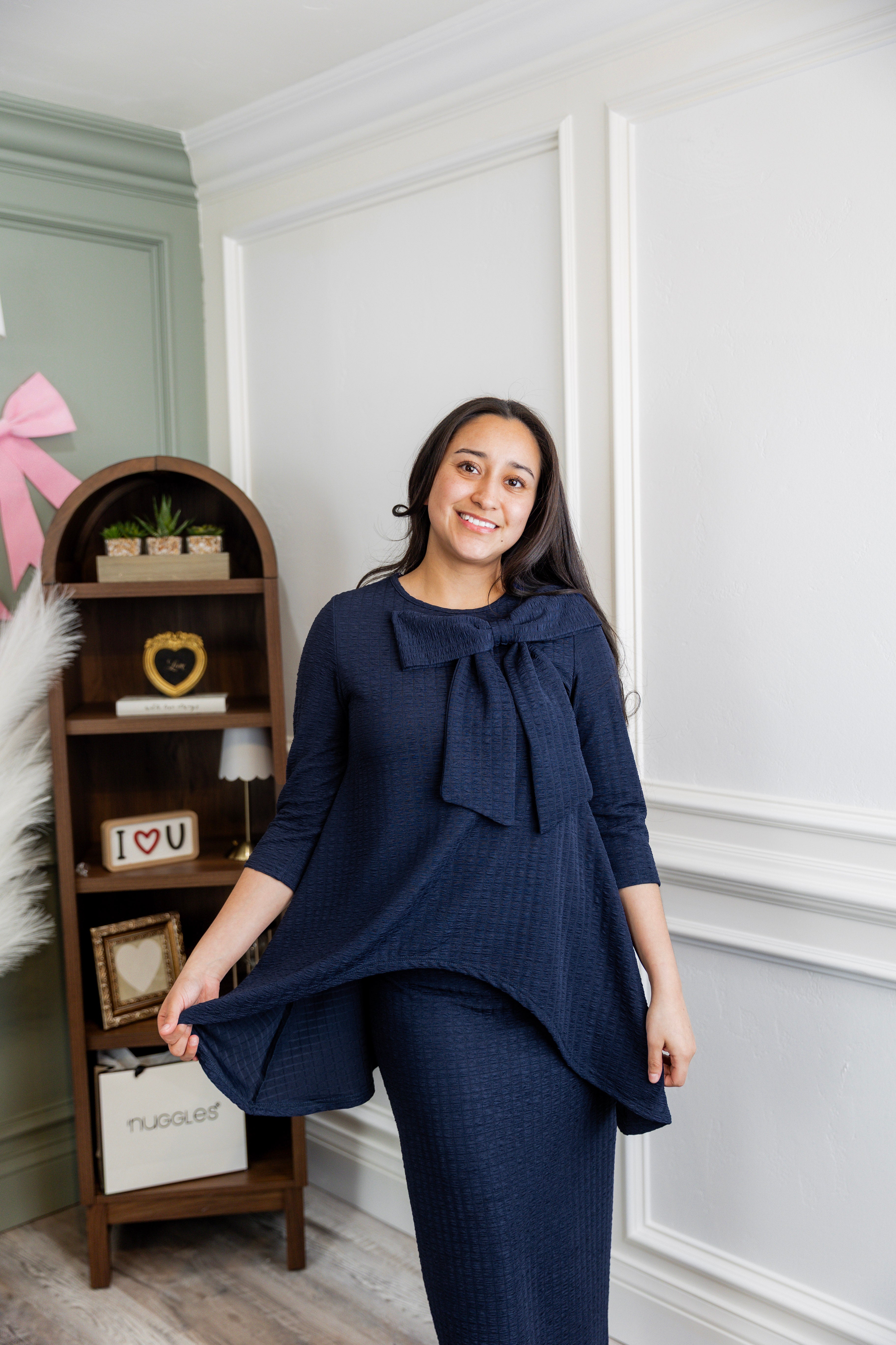 Model wearing Nuggles® 31' Eleanor Skirt in Navy