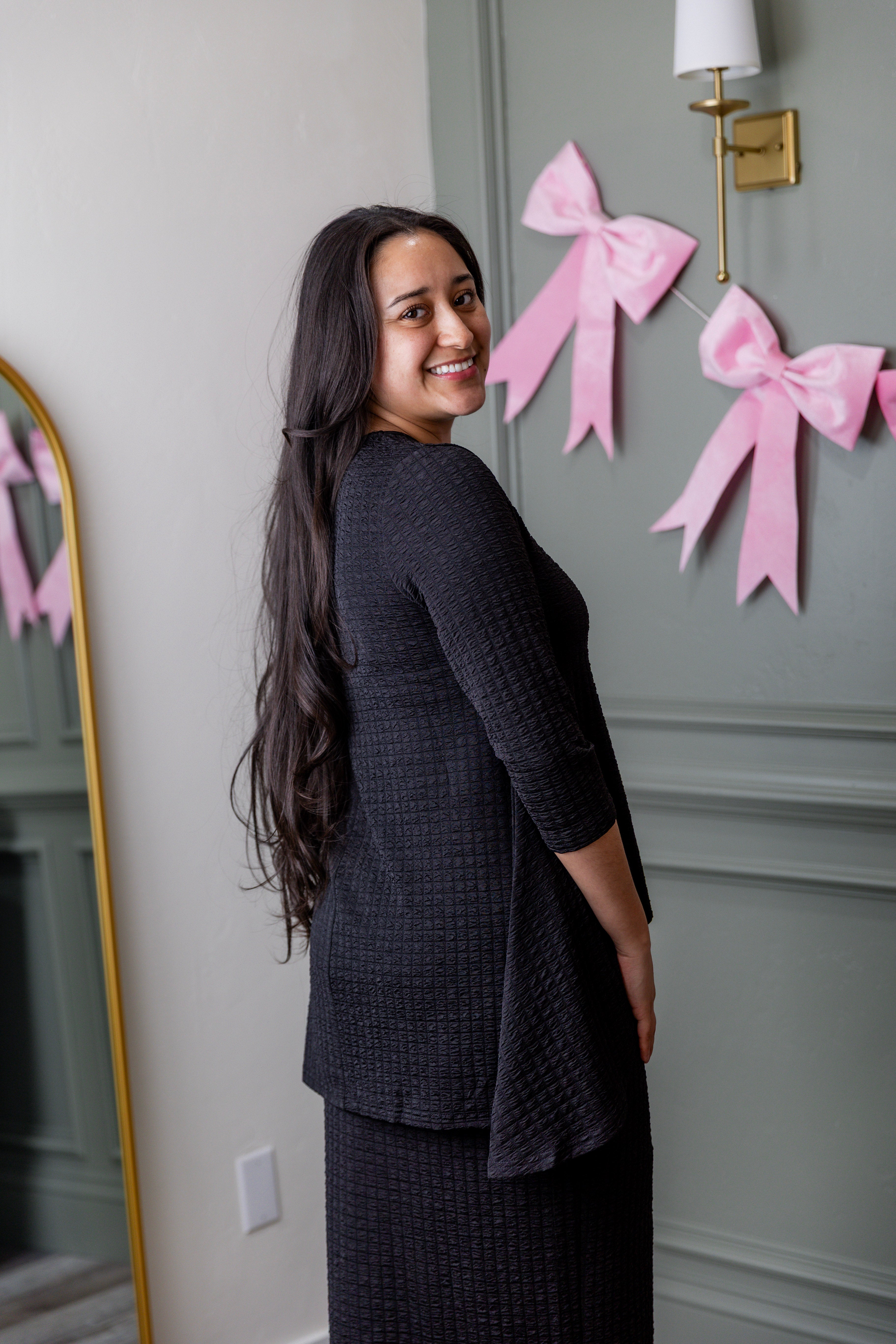 Model wearing Nuggles® Eleanor Top in Black