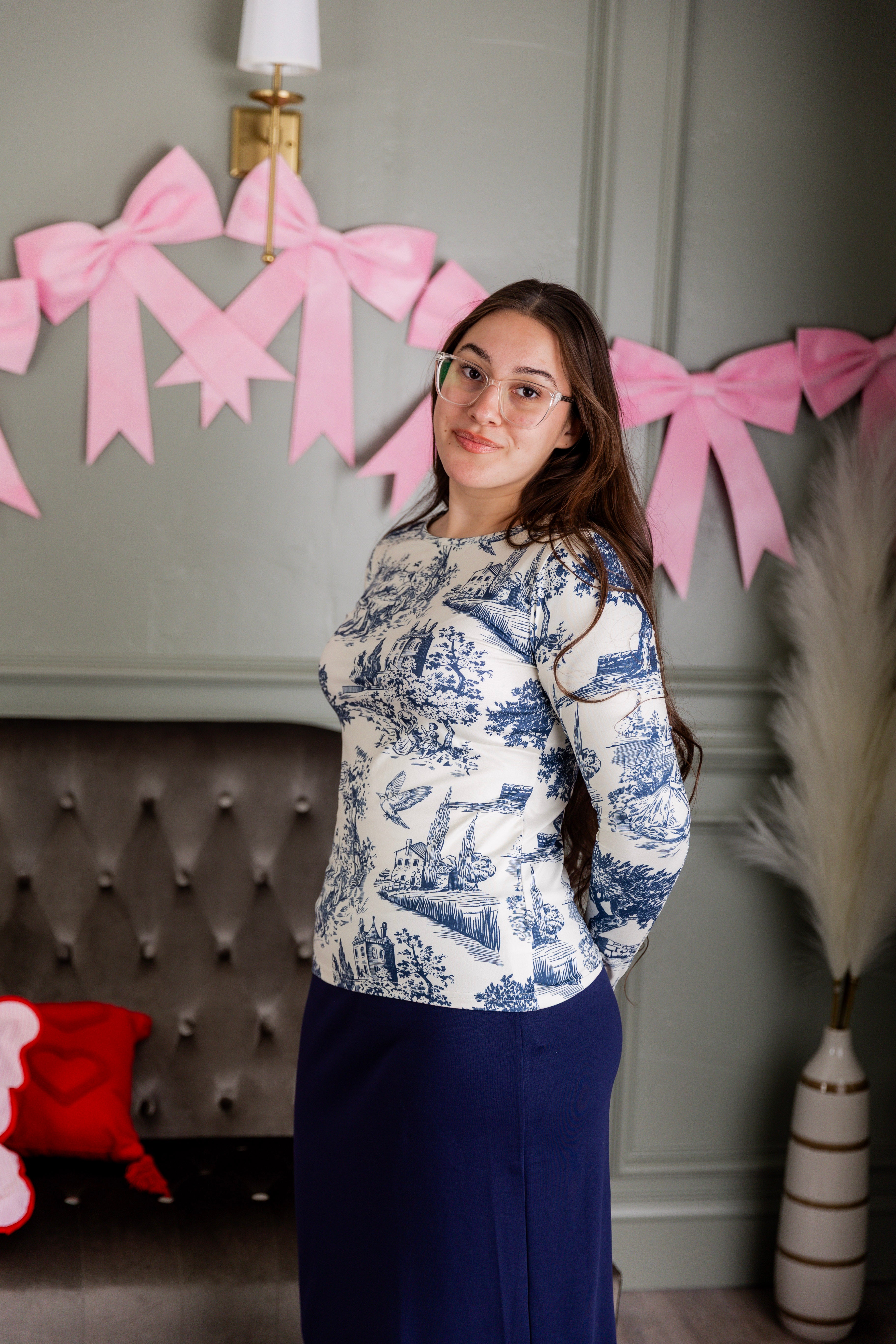 Model wearing Nuggles® Essential Long Sleeve Tee in Storybook Stroll