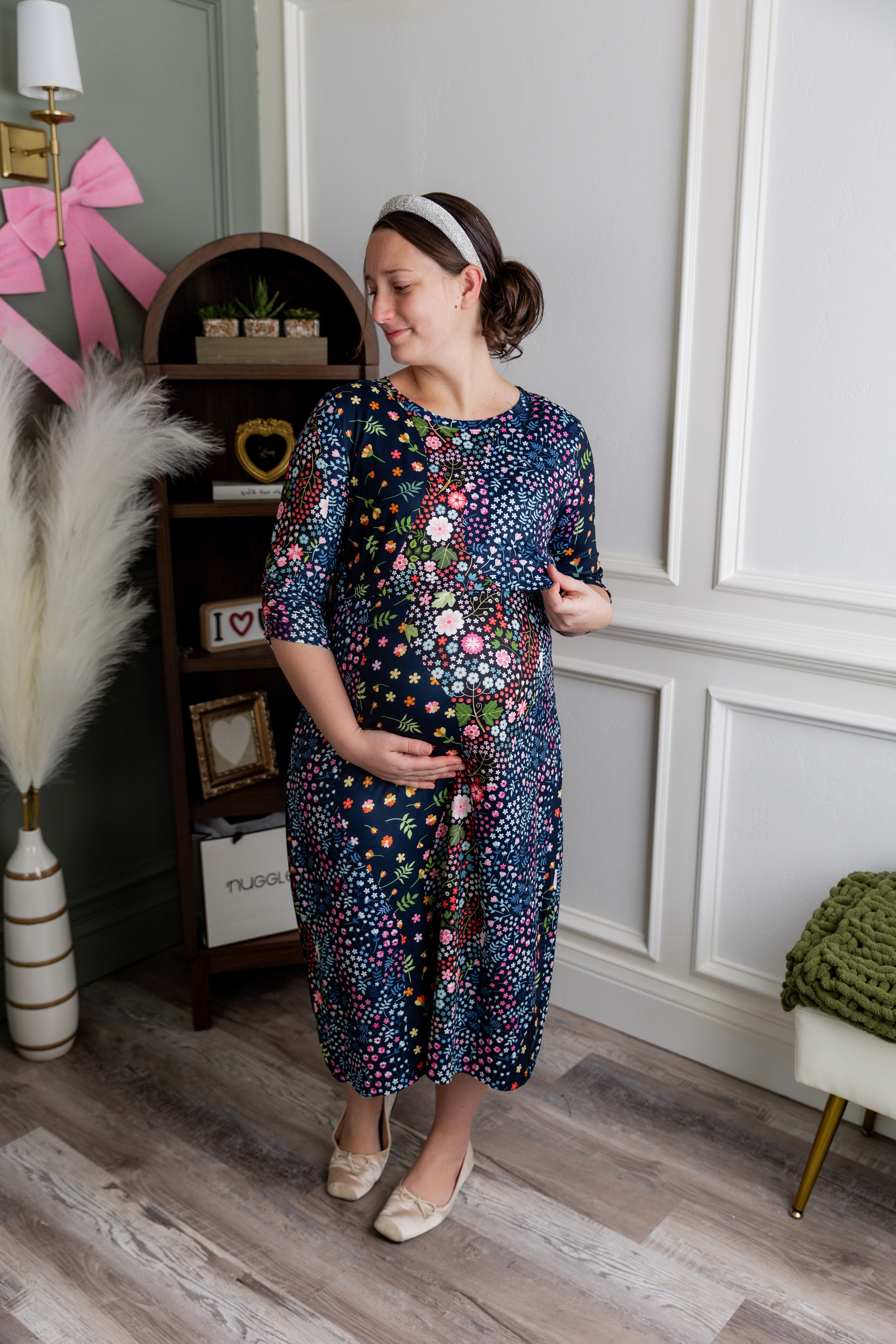 Model wearing Nuggles® Nalani Nursing Dress in Star Garden