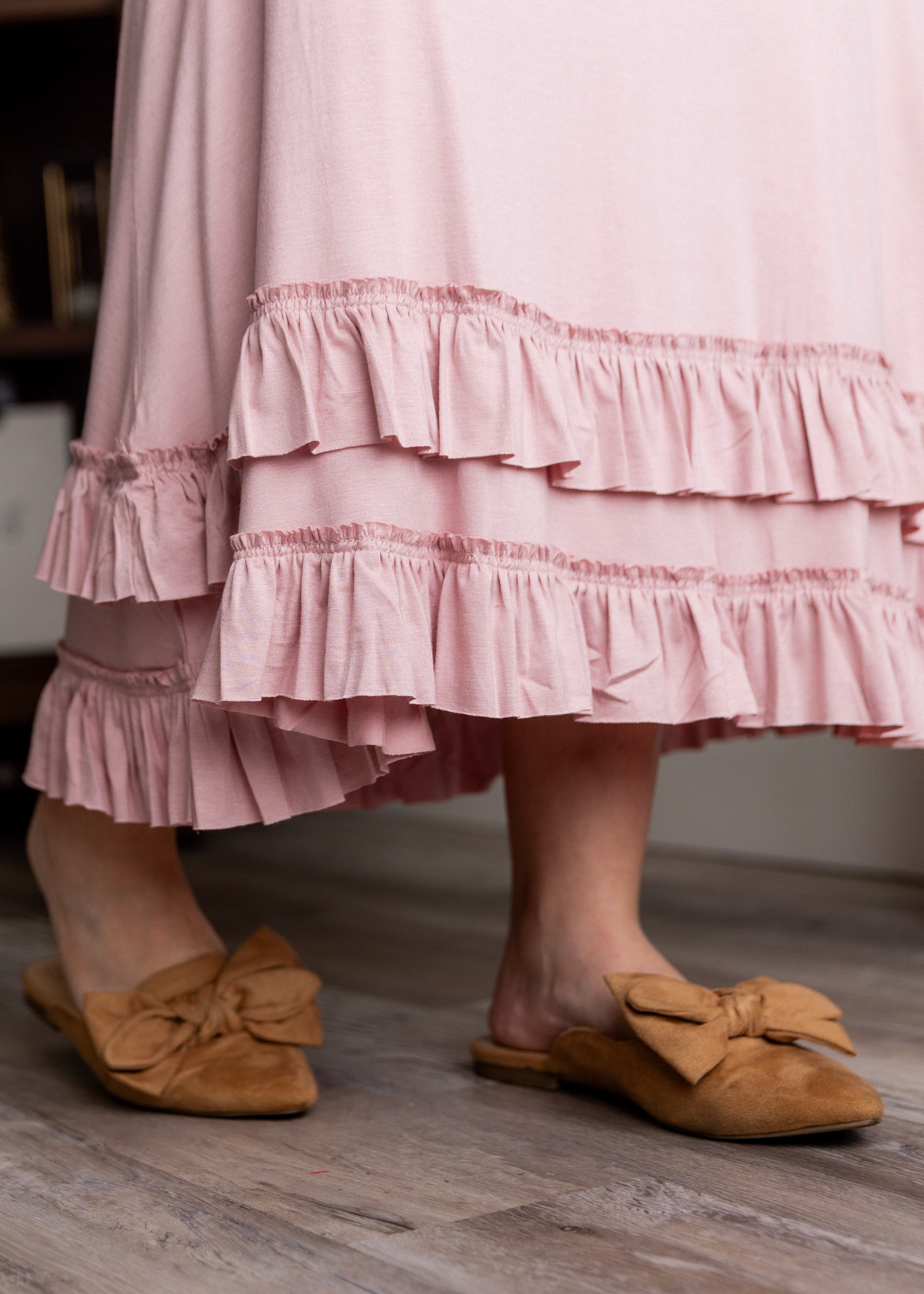 Model wearing Nuggles® Callie Skirt in Baby Pink Modest skirt