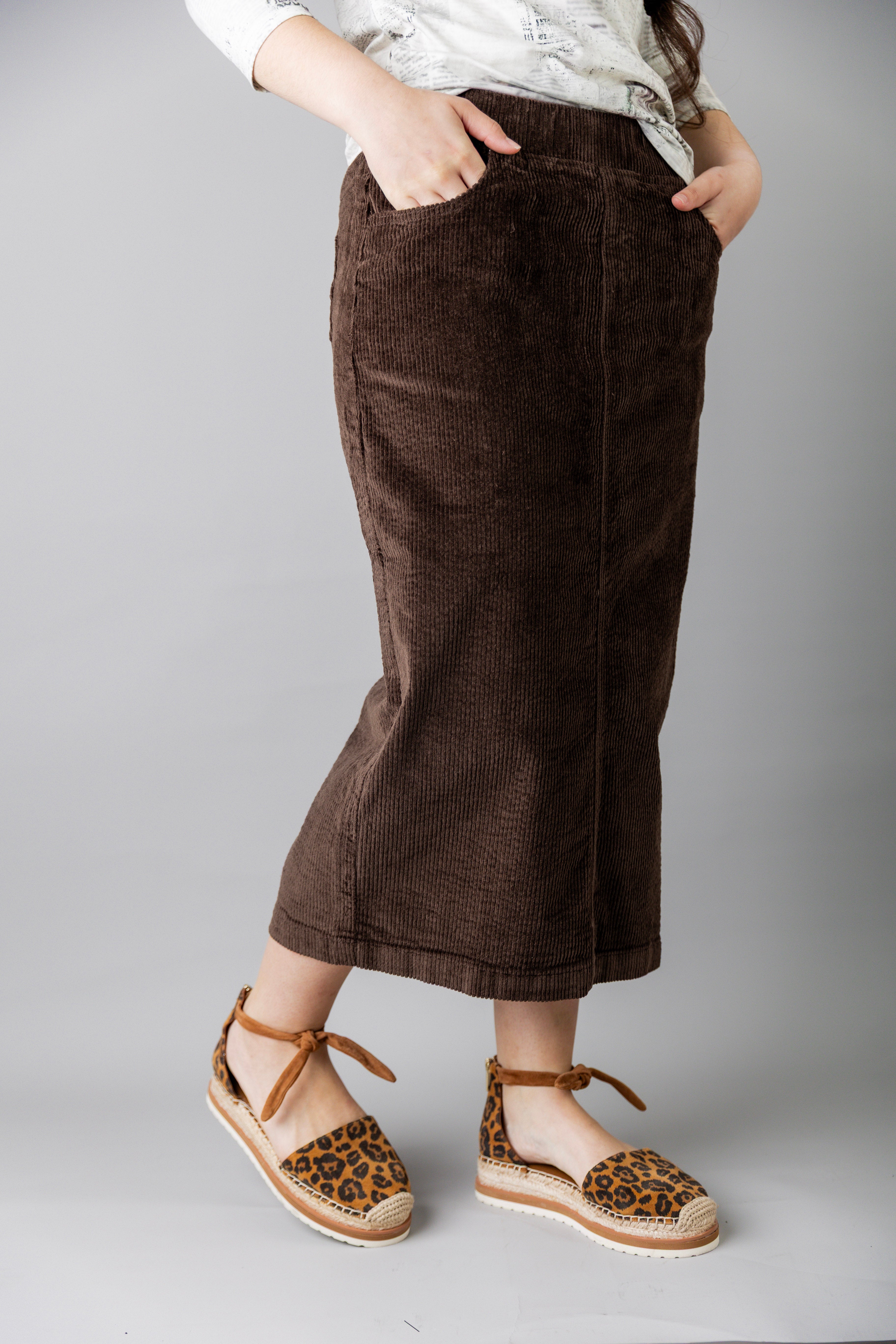 Model wearing Nuggles® 31-inch corduroy skirt