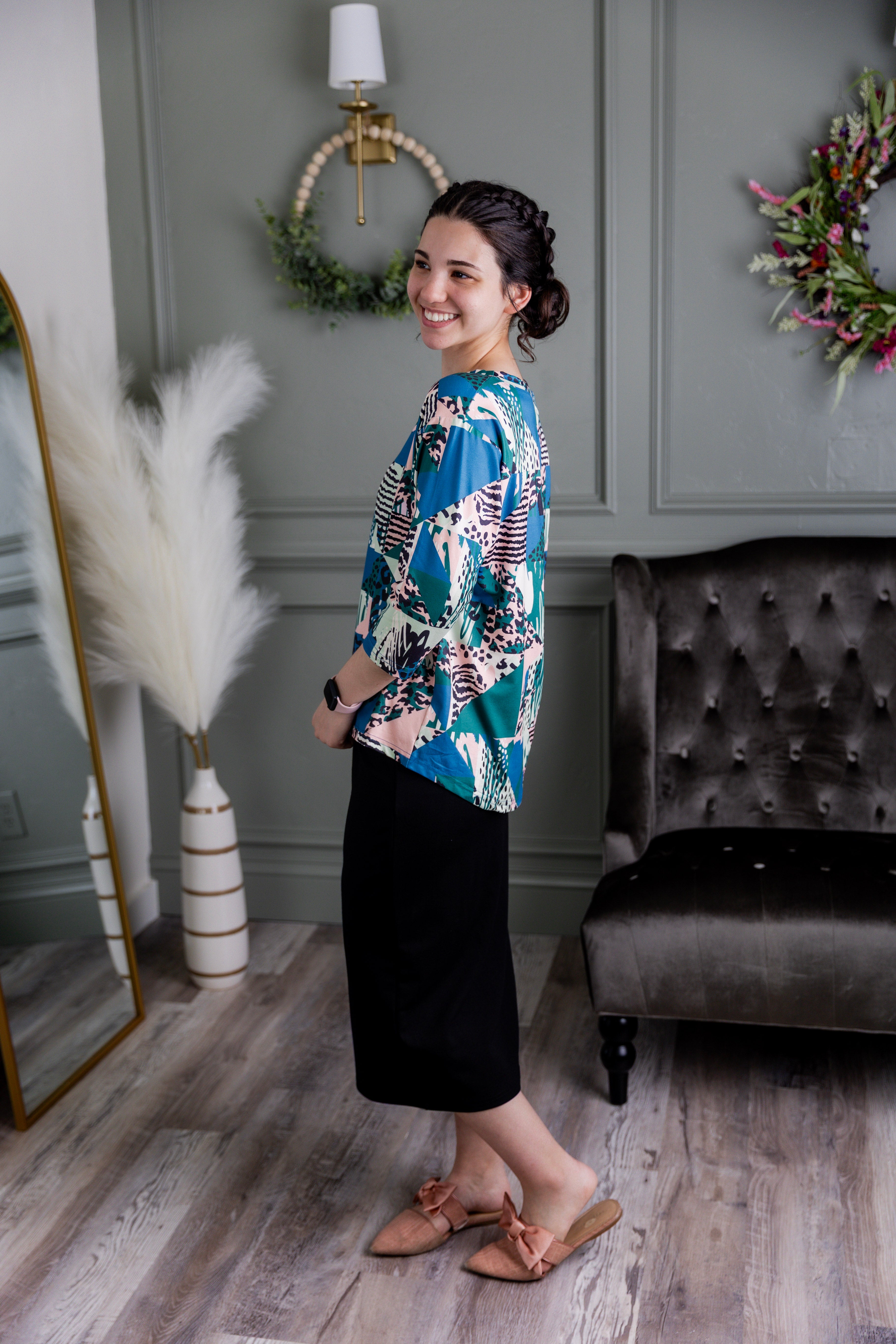 Model wearing the Nuggles® Lucia Top in Neon Boardwalk