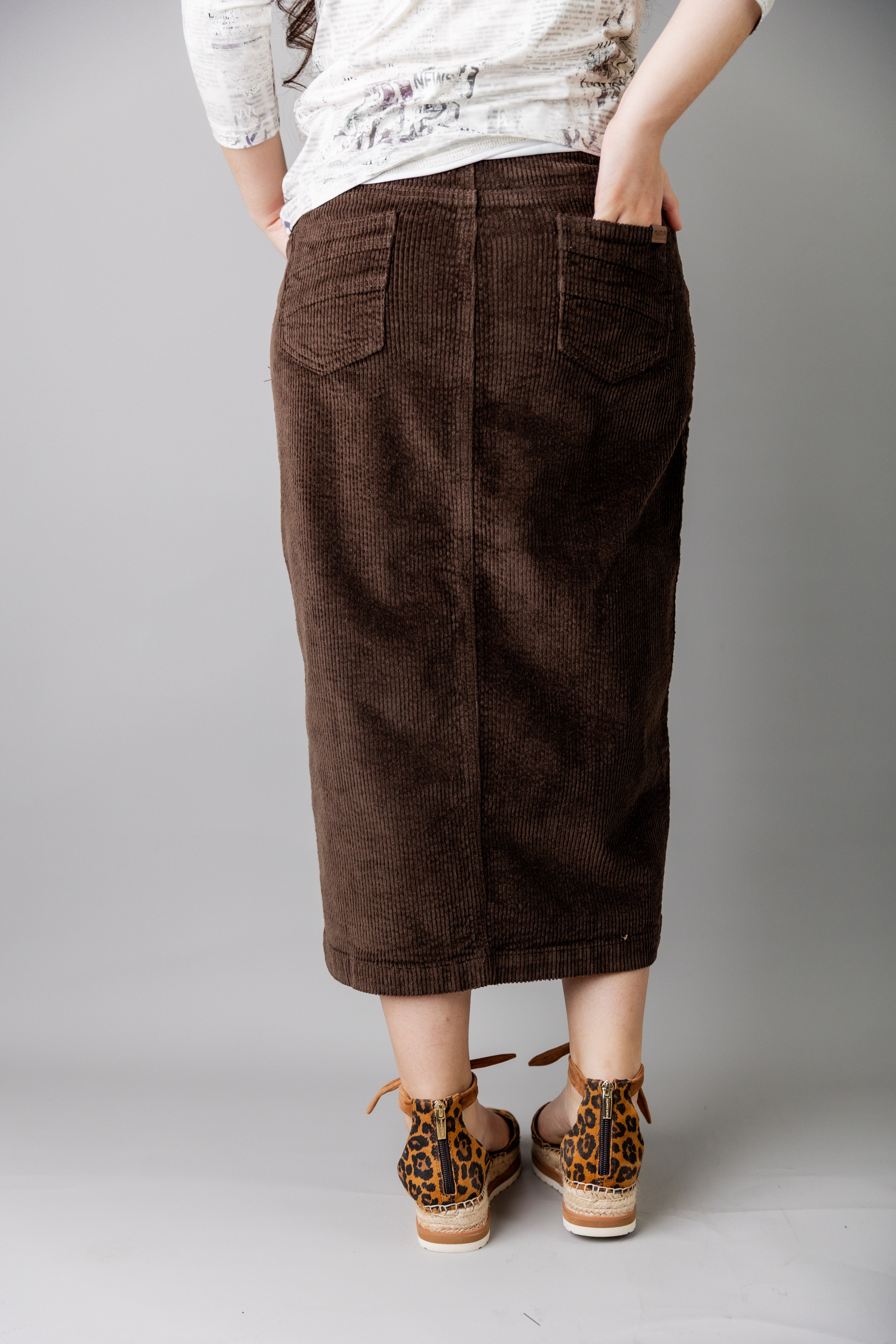 Model wearing Nuggles® 31-inch corduroy skirt