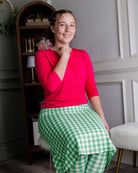 Model wearing Nuggles® Tilly Sport Skirt in Meadow Check
