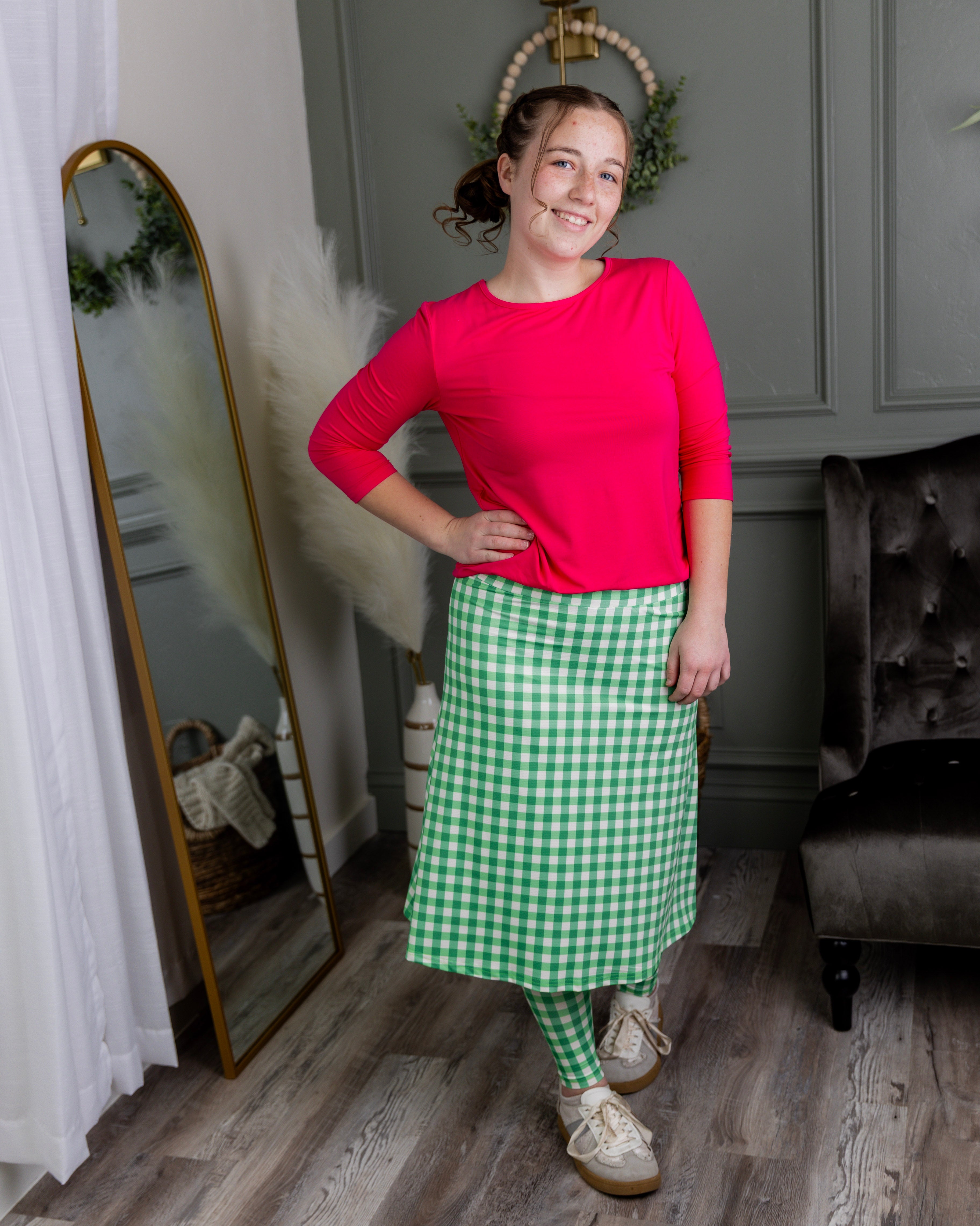 Model wearing Nuggles® Tilly Sport Skirt in Meadow Check