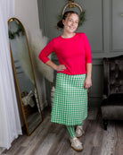 Model wearing Nuggles® Tilly Sport Skirt in Meadow Check