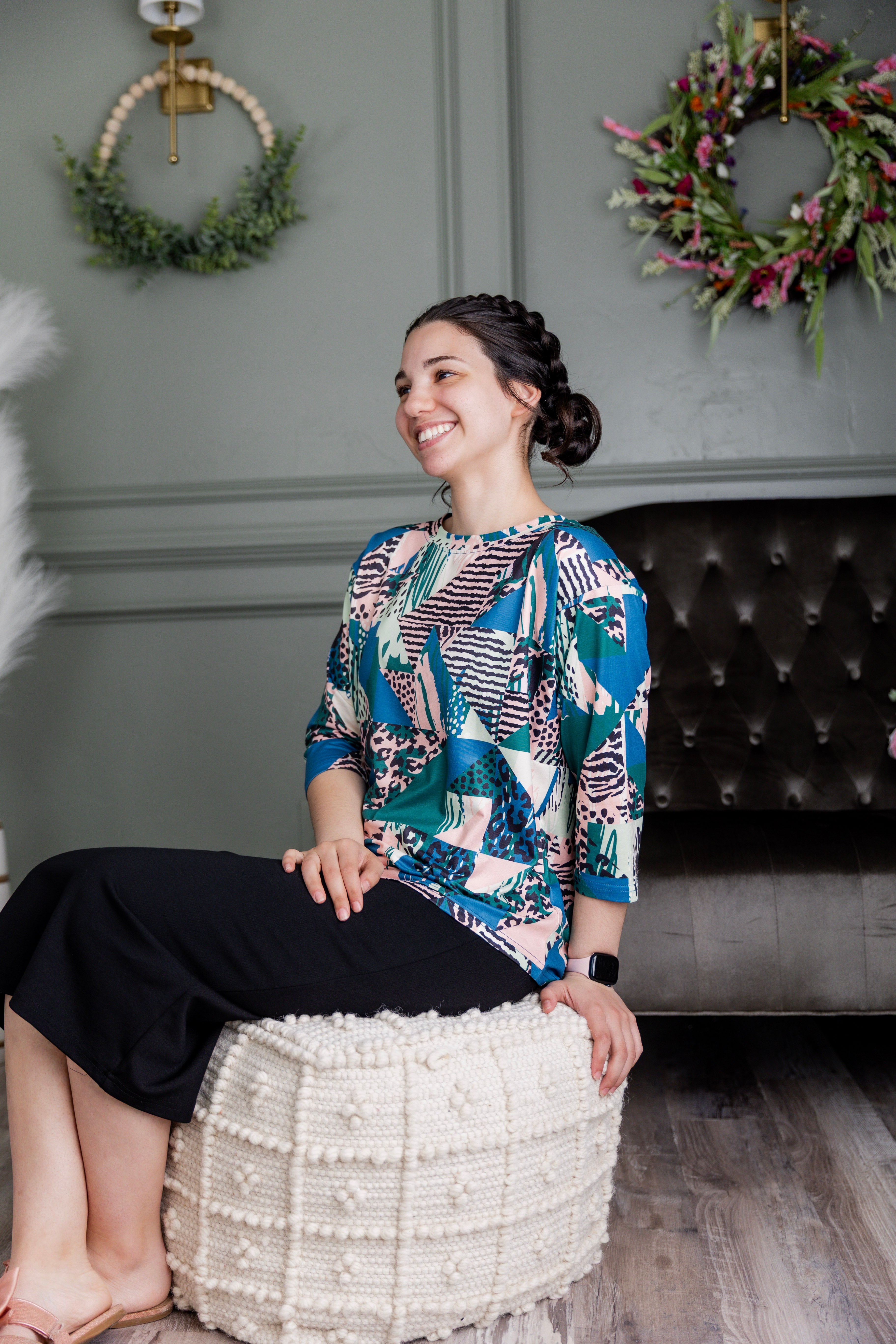 Model wearing the Nuggles® Lucia Top in Neon Boardwalk