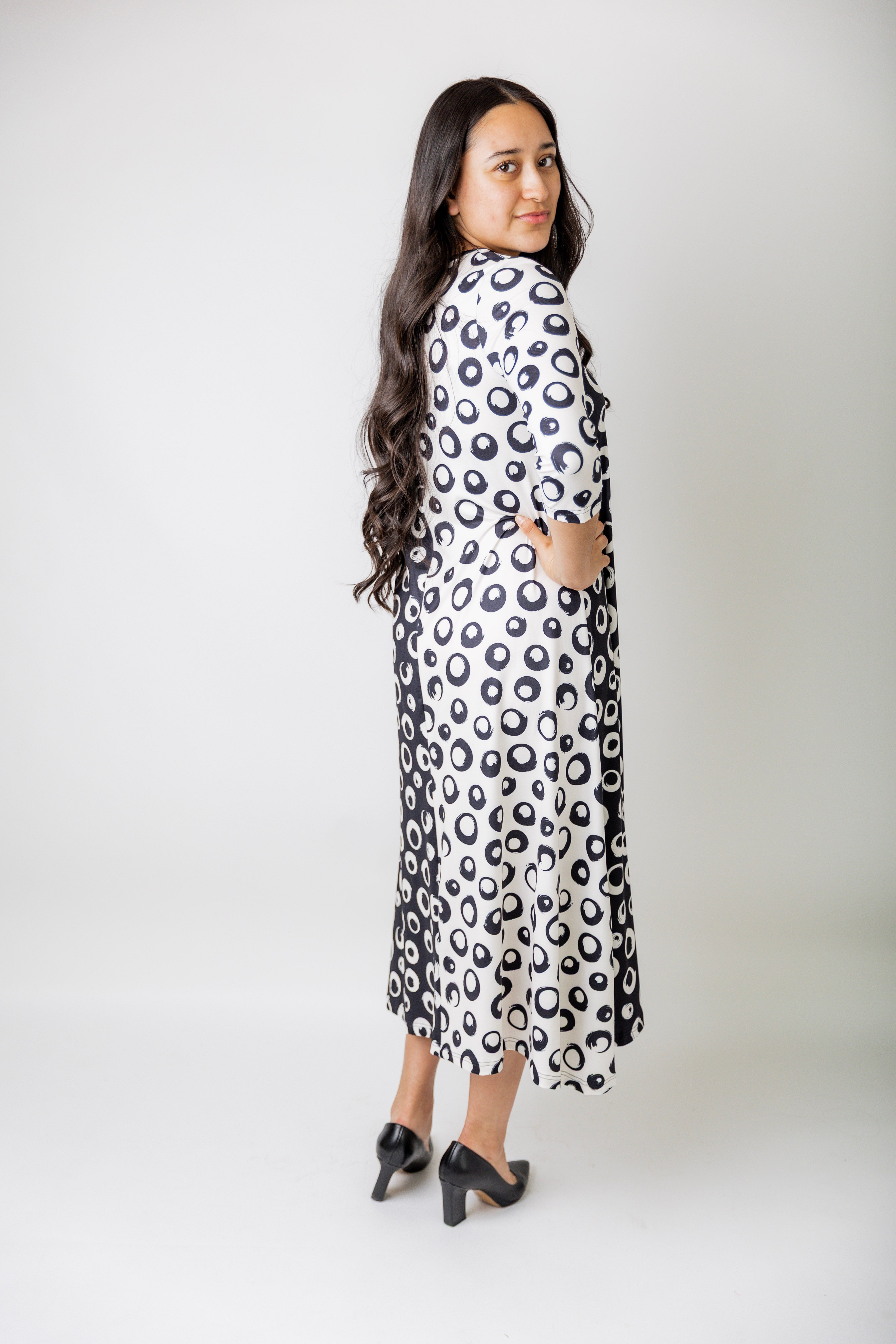 Model wearing the Nuggles® Liana Dress – modest midi dress with ¾ sleeves
