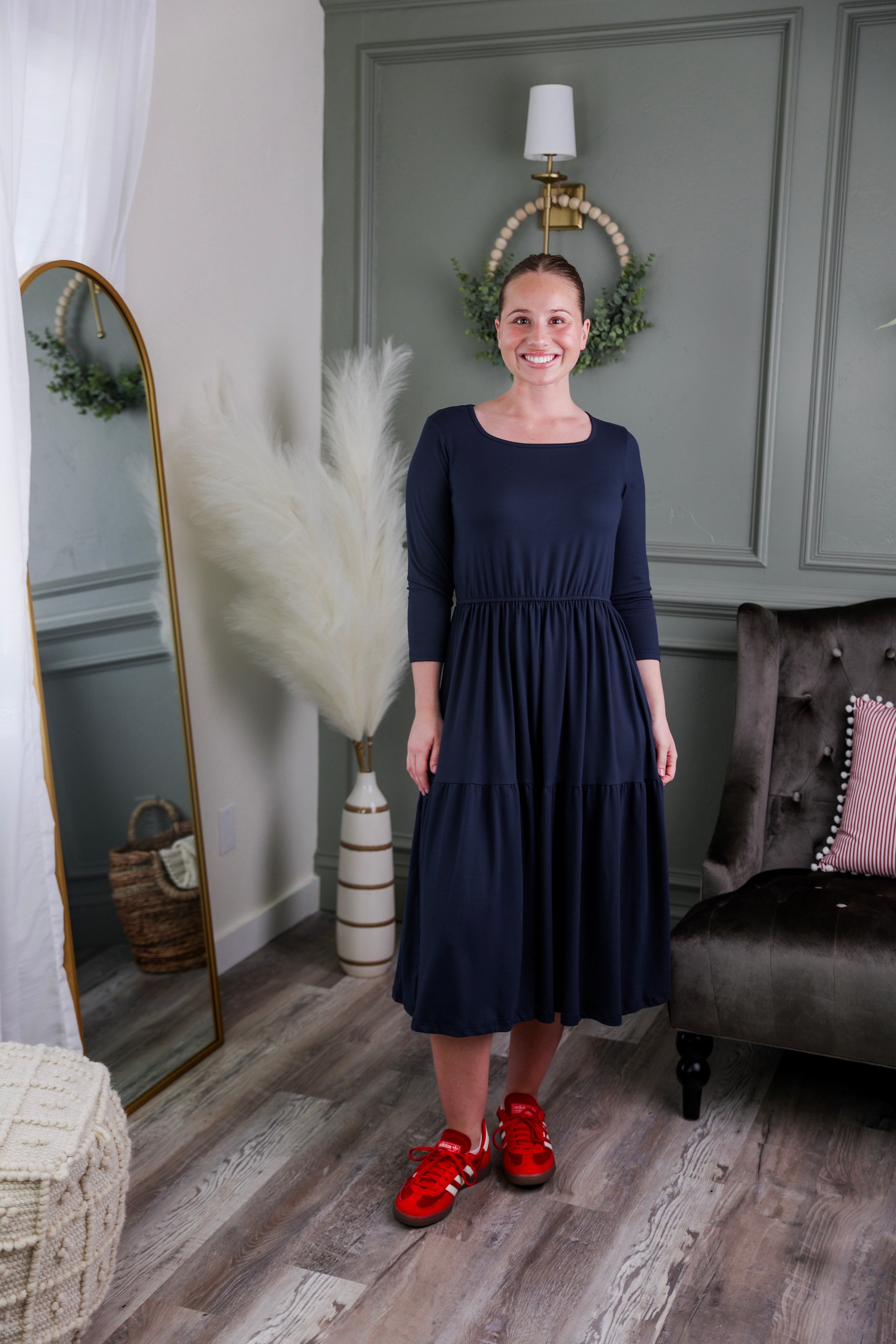 Model wearing Modest Nuggles® Nova Dress in Navy