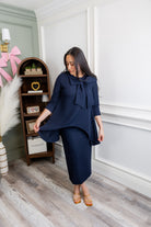 Model wearing Nuggles® 31' Eleanor Skirt in Navy