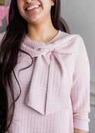 Model wearing Nuggles® Eleanor Top in Pink