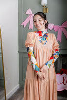 Model wearing Nuggles® Mesh Tee top in Triangle Taffy