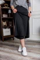 Model wearing Nuggles® 31" All-Sport Skirt in Black