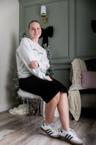 Model wearing Nuggles® 25-inch corduroy skirt