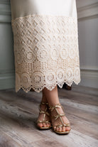Model wearing our modest Nuggles® 31" crochet lace slip in Beige