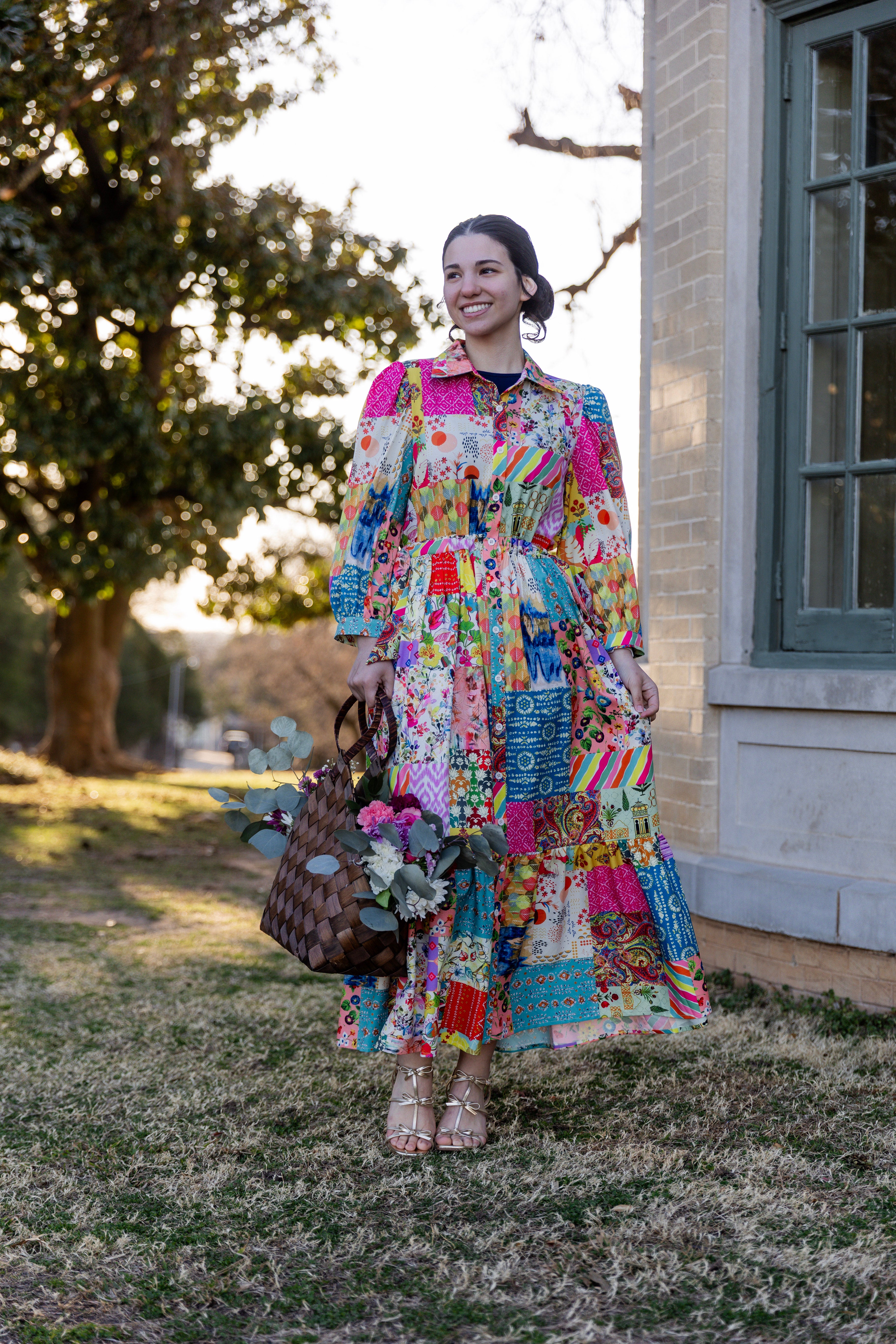 Model wearing the Nuggles® Leila Dress in Keepsake Quilt