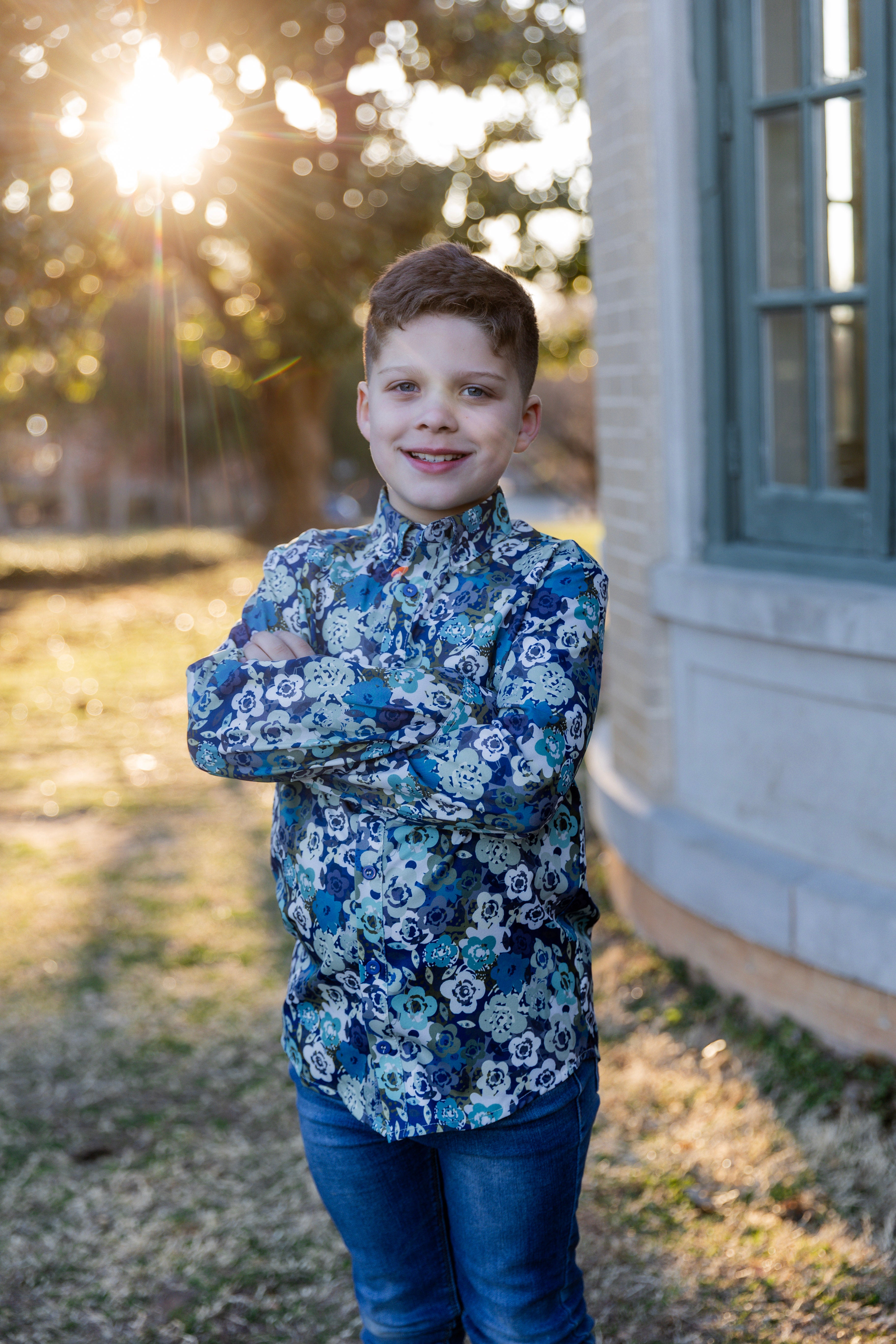 Model wearing Nuggles® Boys' Button Down Shirt Storm Brush