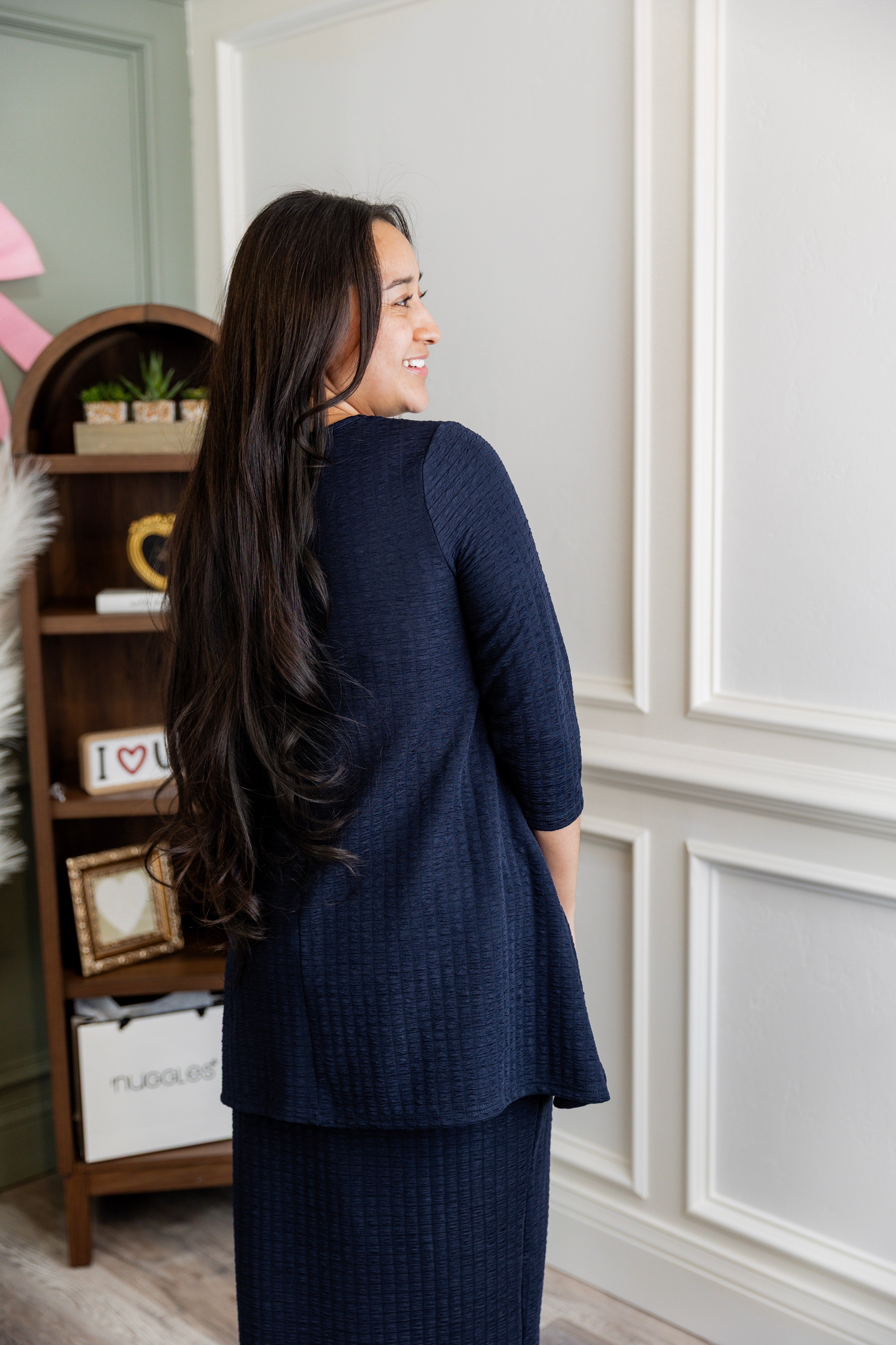 Model wearing Nuggles® Eleanor Top in Navy