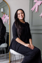 Model wearing Nuggles® Eleanor Top in Black