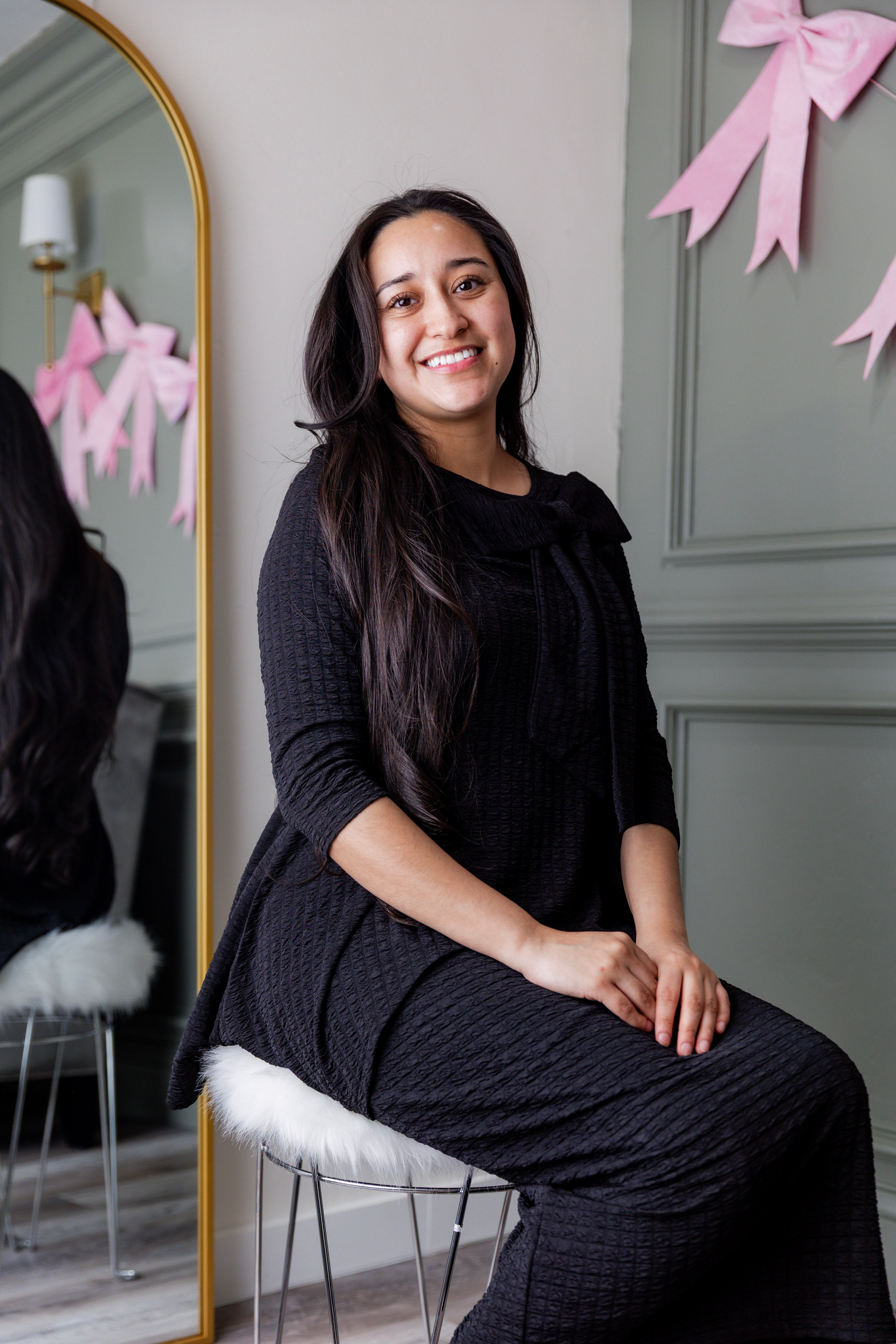 Model wearing Nuggles® Eleanor Top in Black