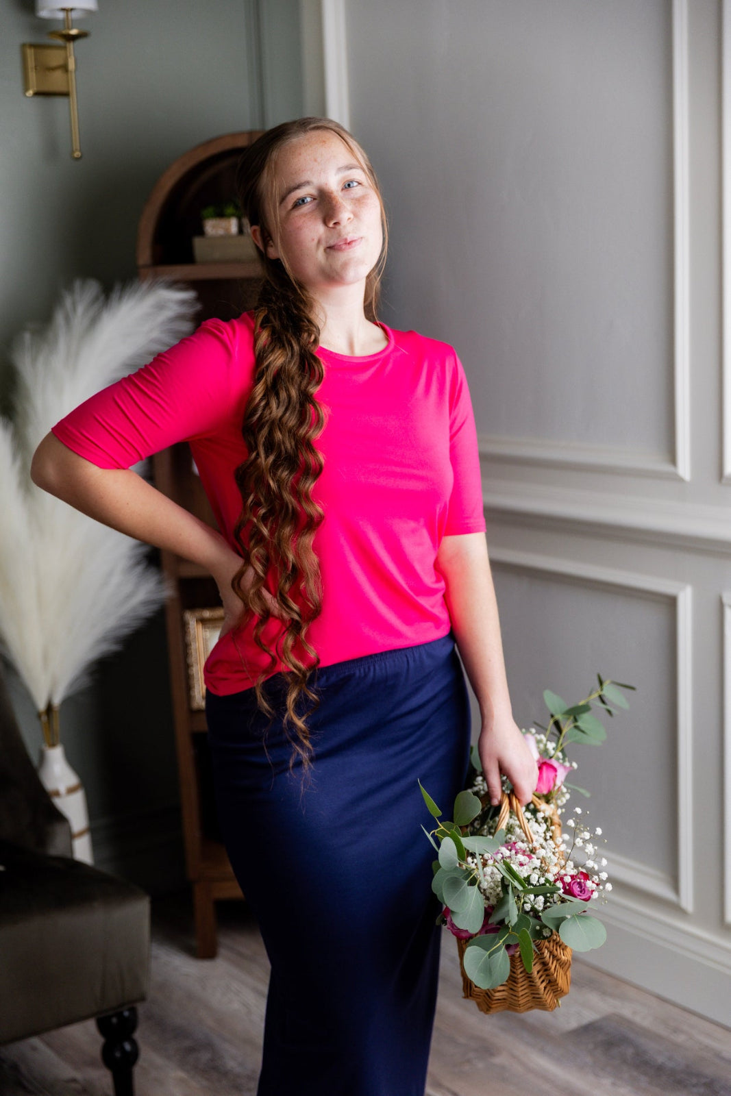 Model wearing the Nuggles® Essential Half Sleeve Tee in Hot Pink