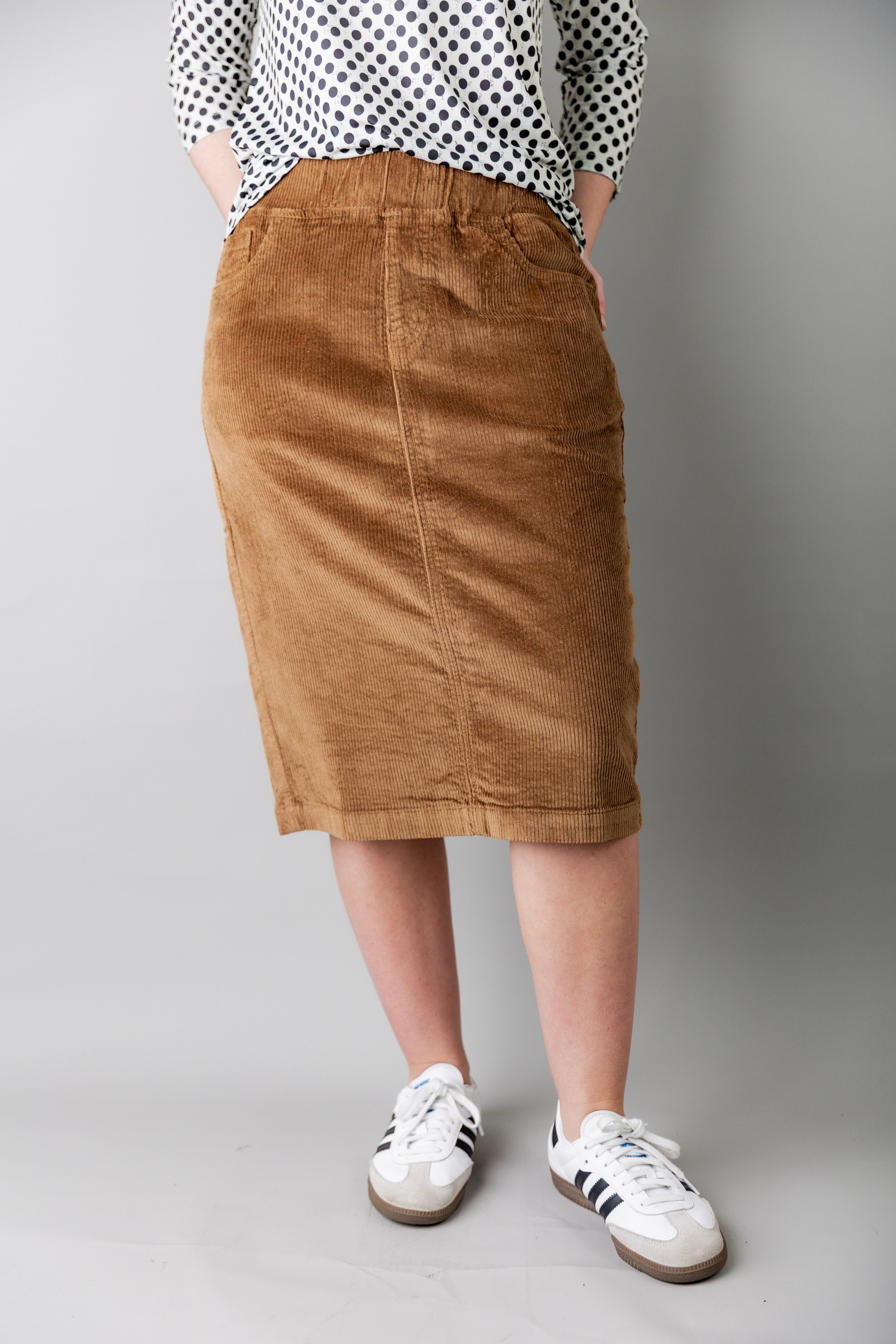 Model wearing Nuggles® 25-inch corduroy skirt