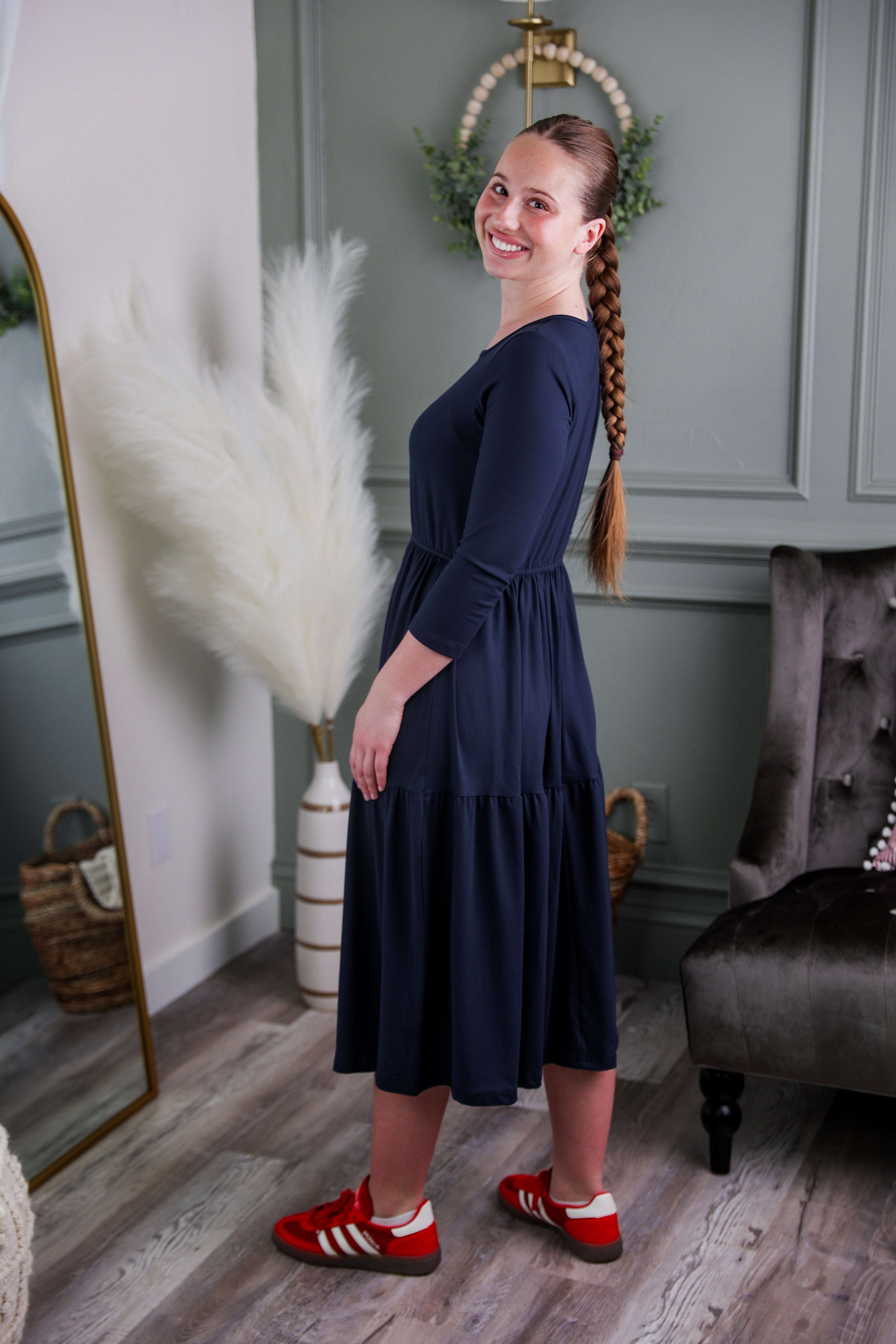 Model wearing Modest Nuggles® Nova Dress in Navy