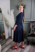 Model wearing Nuggles® Nova Dress in Navy