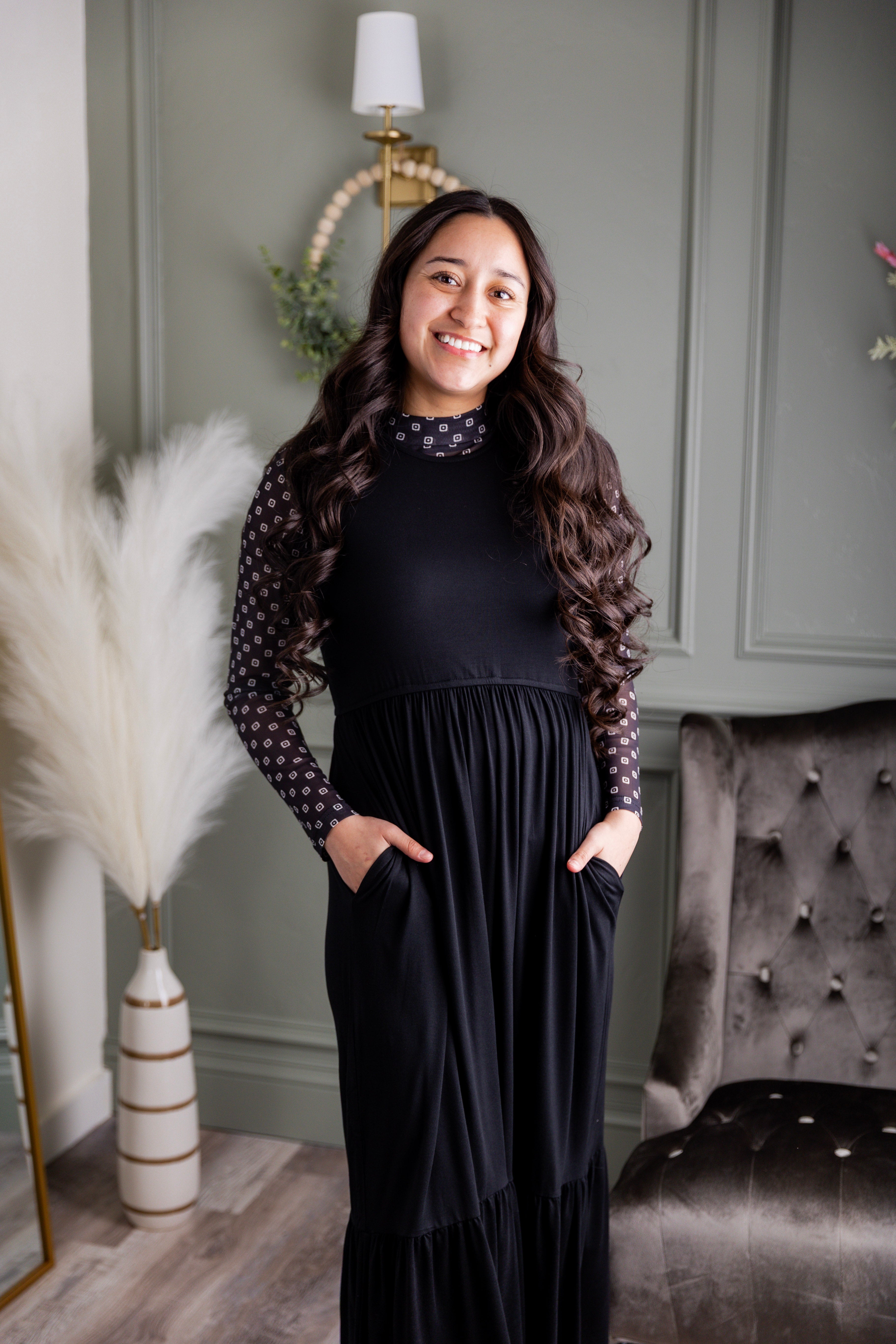 Model wearing the Nuggles® Riley Dress in Black