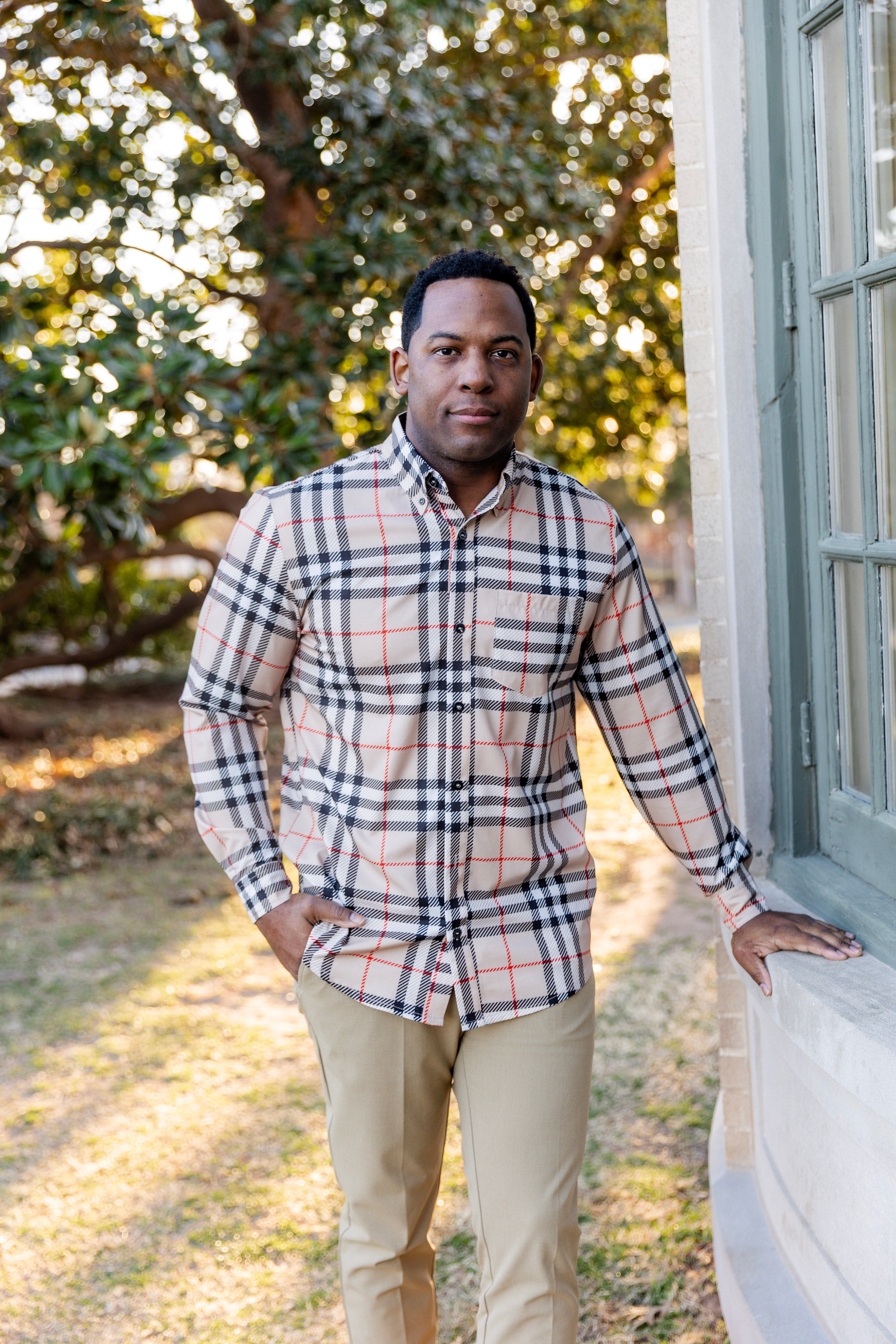 Model wearing Nuggles® Mens' Button Down Shirt Sand Plaid