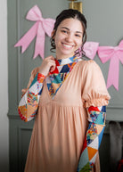 Model wearing Nuggles® Mesh Tee top in Triangle Taffy