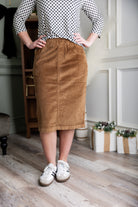 Model wearing Nuggles® 25-inch corduroy skirt