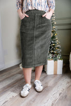 Model wearing Nuggles® 27-inch corduroy skirt
