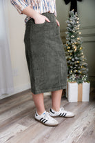 Model wearing Nuggles® 27-inch corduroy skirt