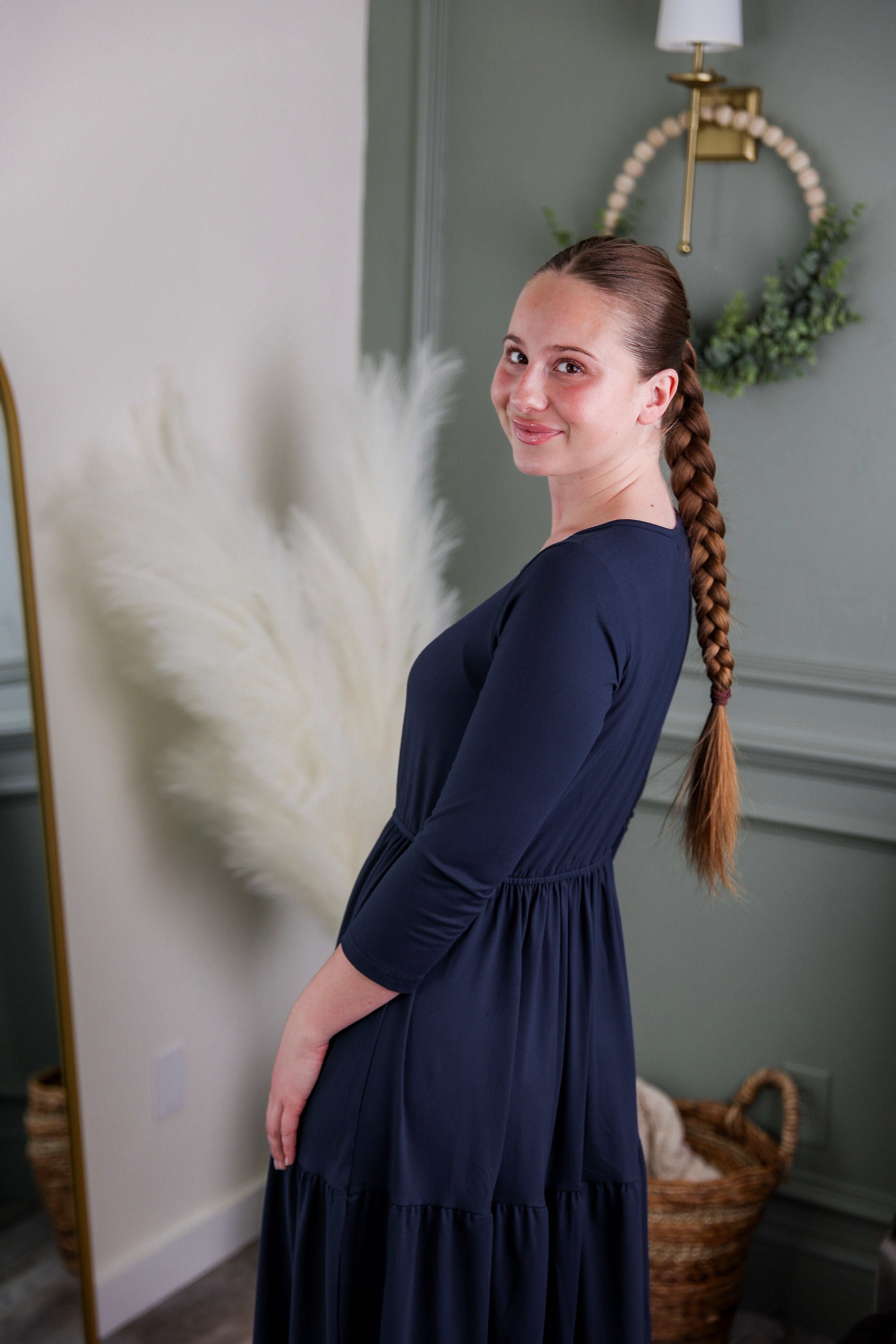 Model wearing Modest Nuggles® Nova Dress in Navy