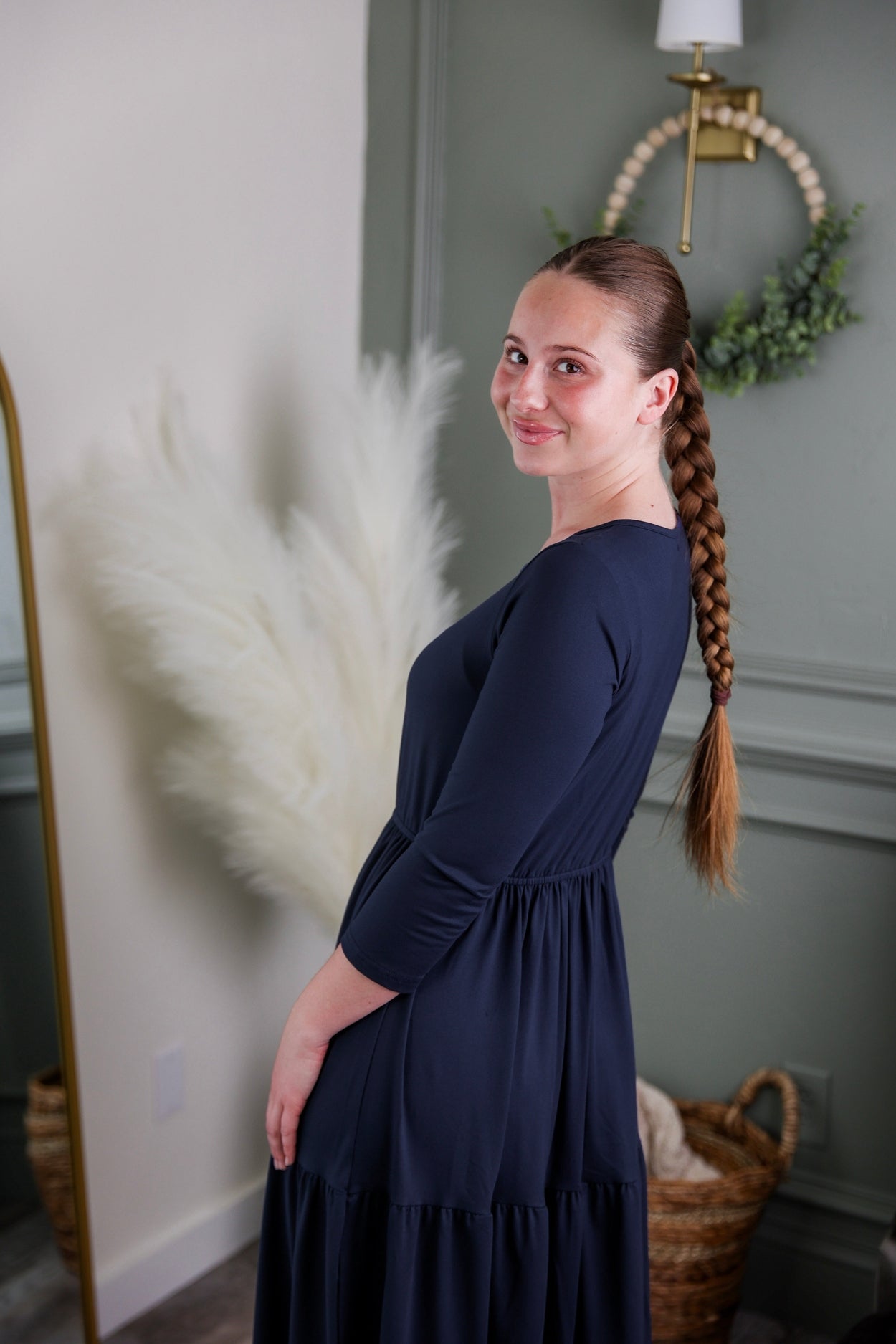 Model wearing Nuggles® Nova Dress in Navy