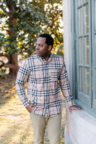 Model wearing Nuggles® Mens' Button Down Shirt Sand Plaid