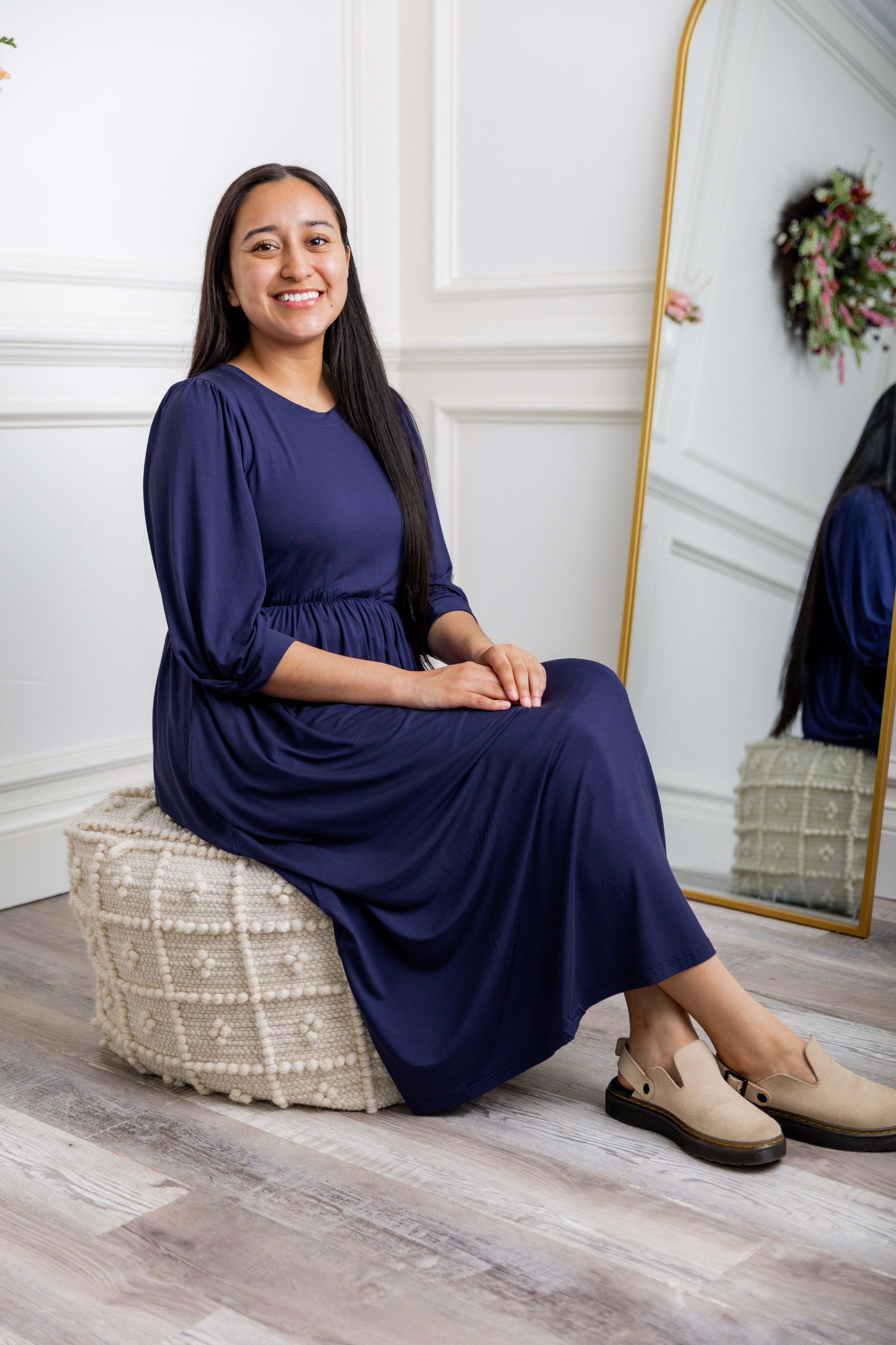 Modest Willow Solid Colors Dress by Nuggles® featuring a gathered waist, balloon sleeves, and side pockets; shown in various solid colors and angles for a stylish, comfortable everyday look.